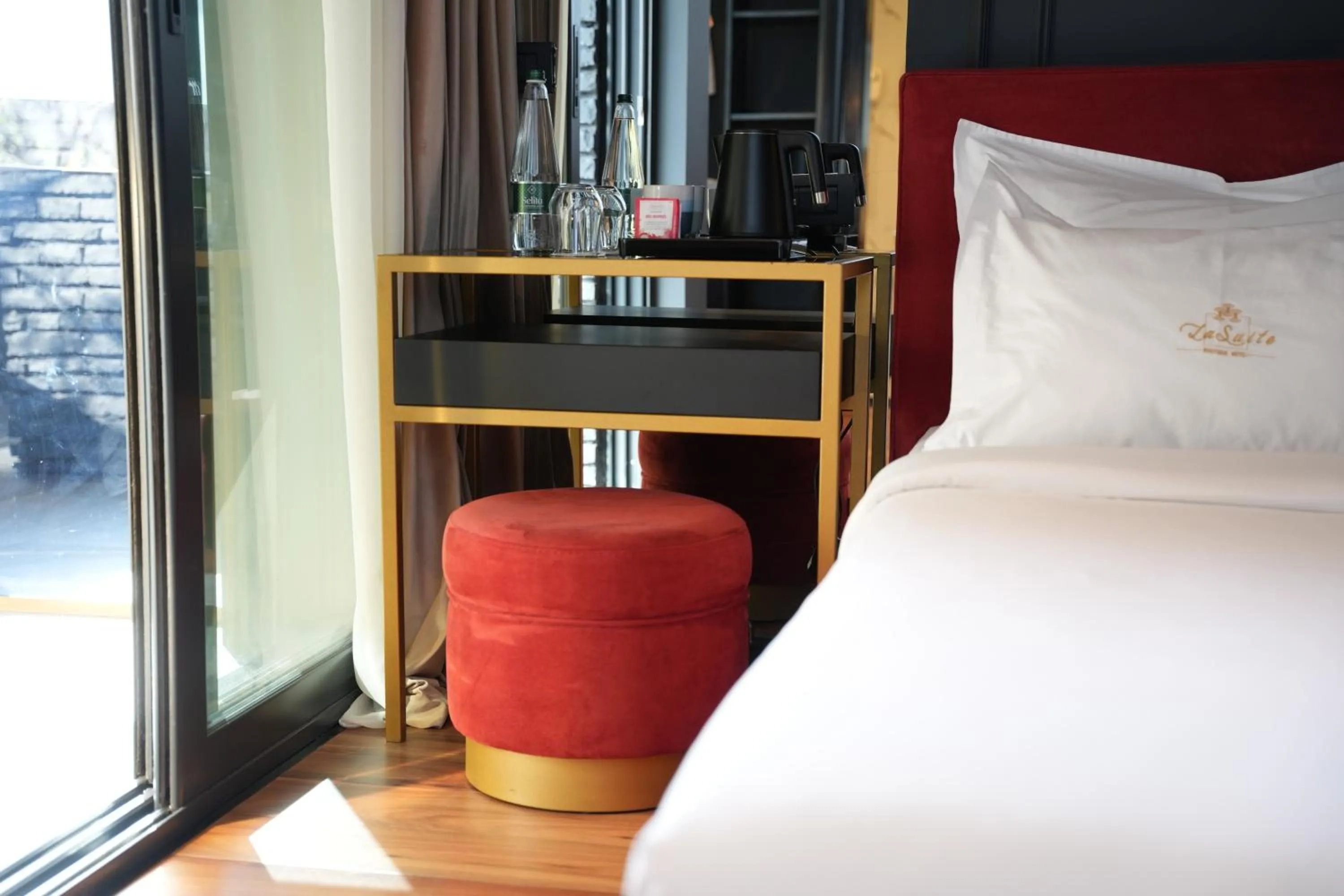 Bed in La Suite Boutique Hotel