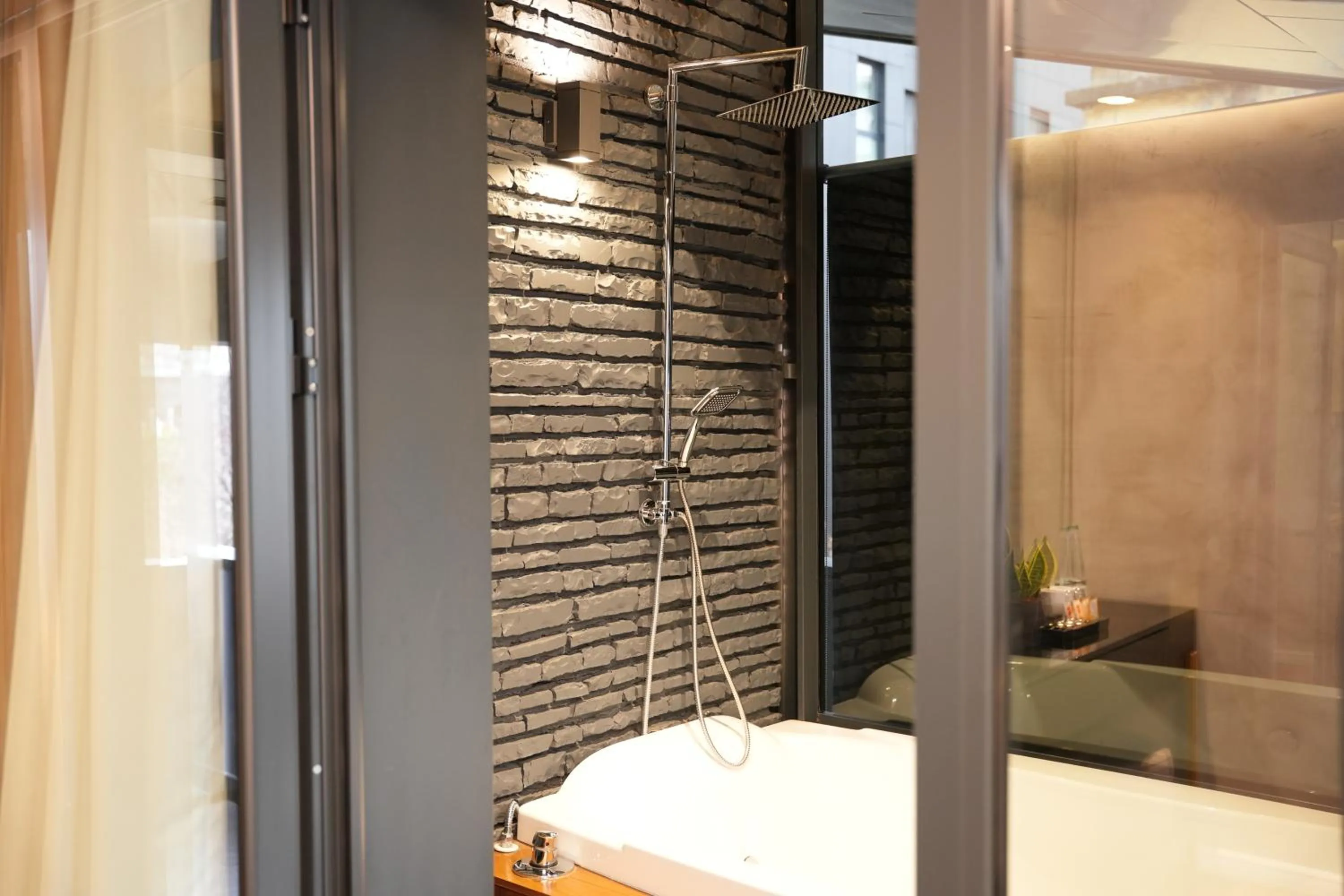 Shower in La Suite Boutique Hotel