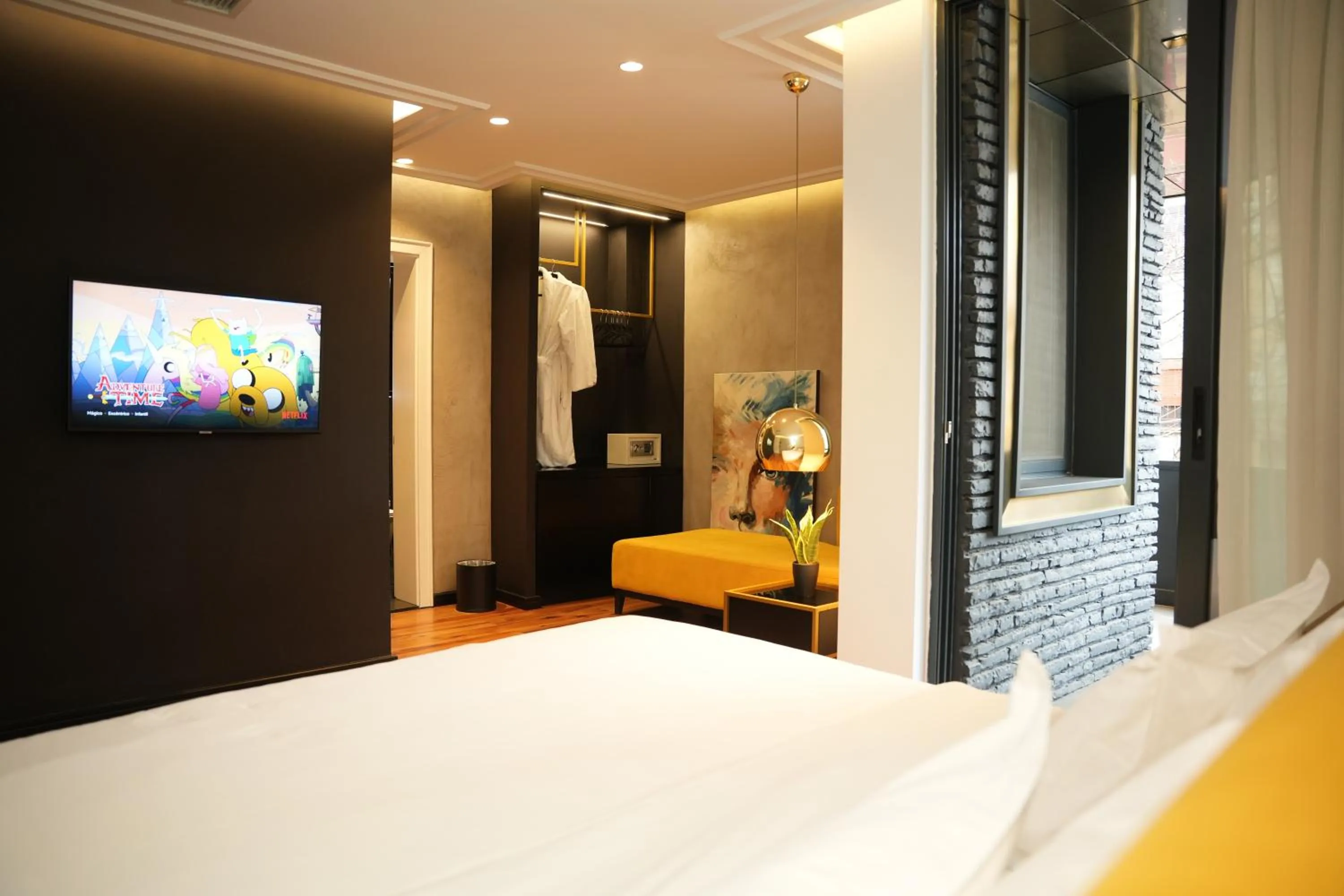 Bed in La Suite Boutique Hotel