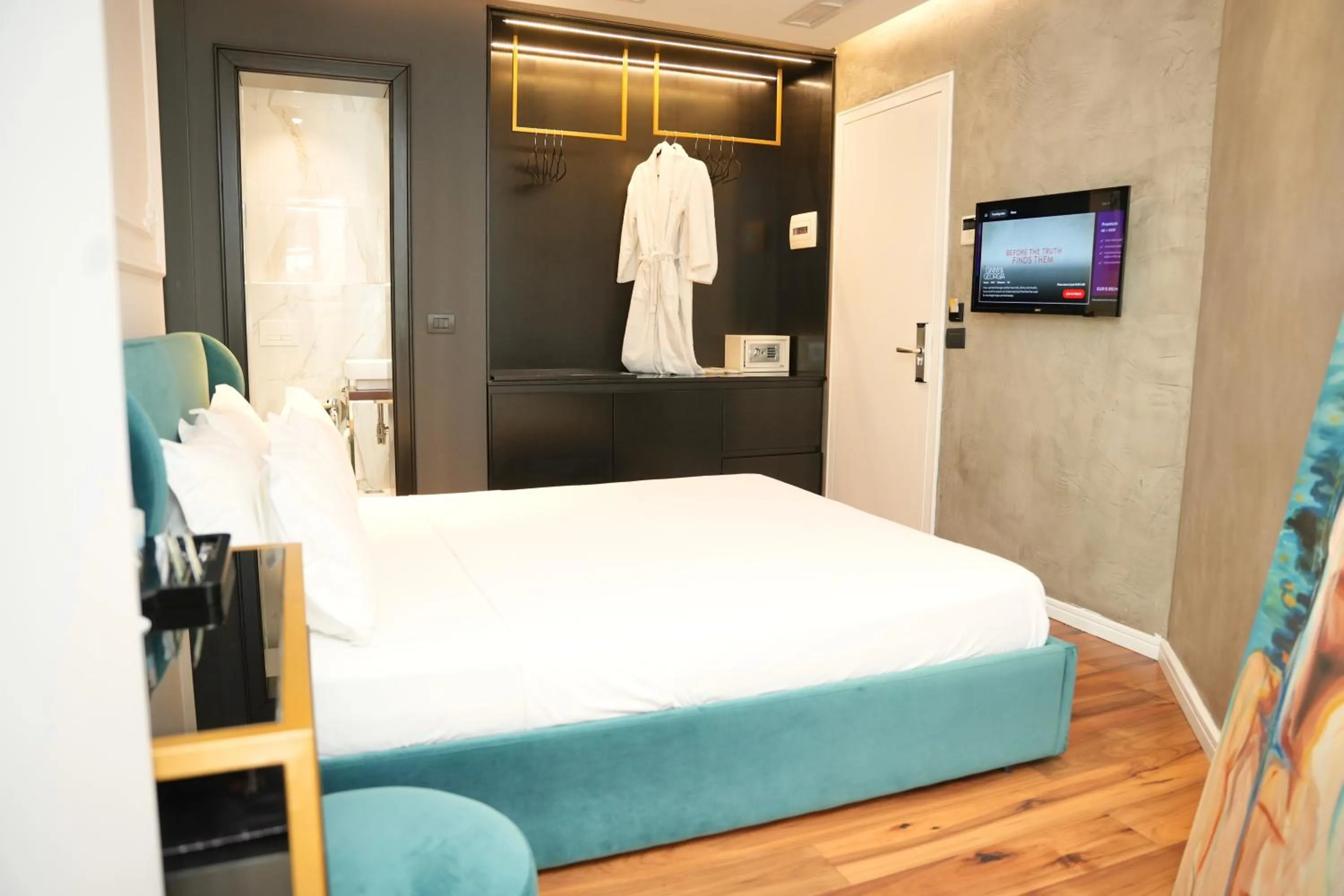 Bed in La Suite Boutique Hotel