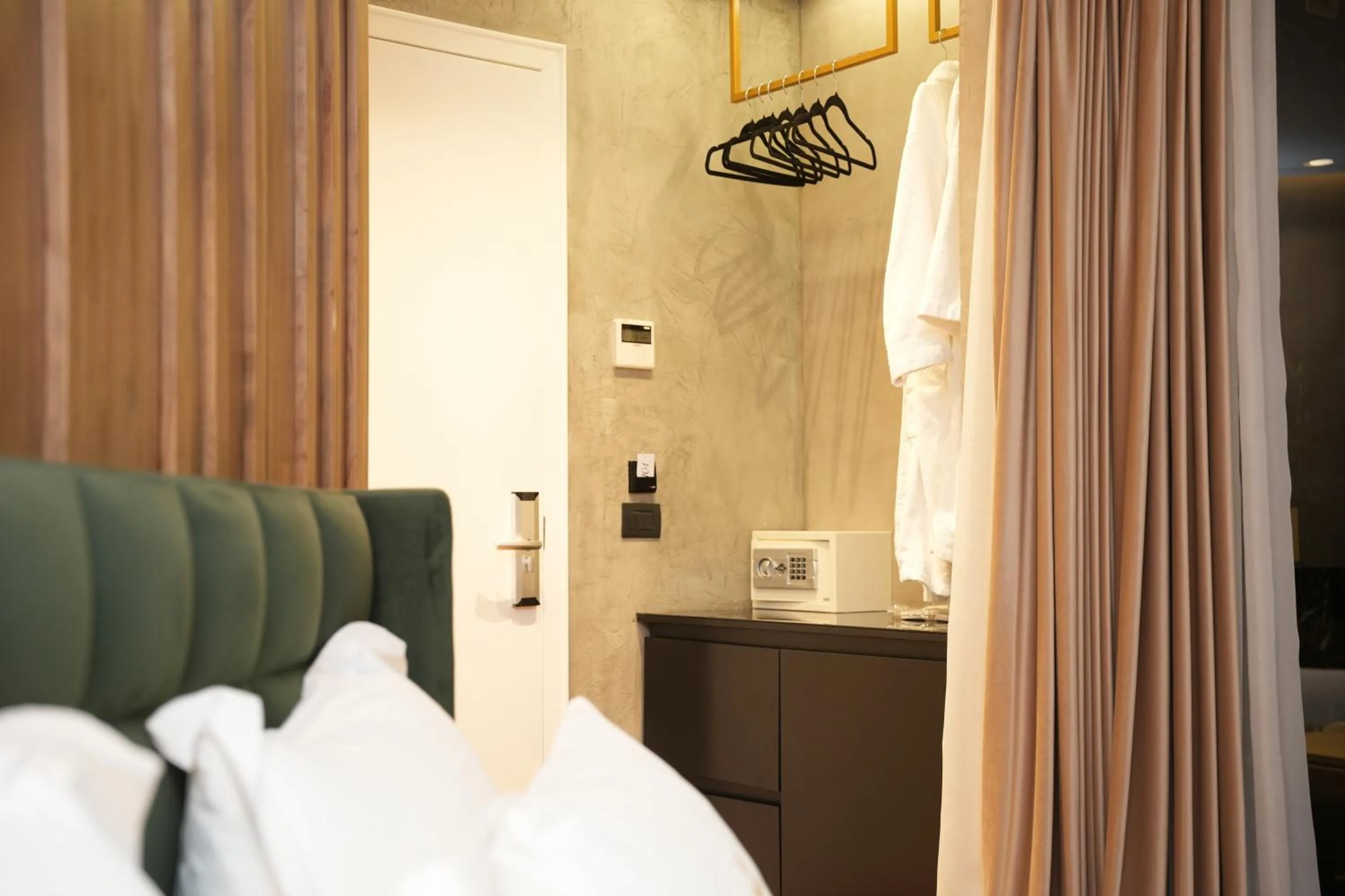 Bed in La Suite Boutique Hotel