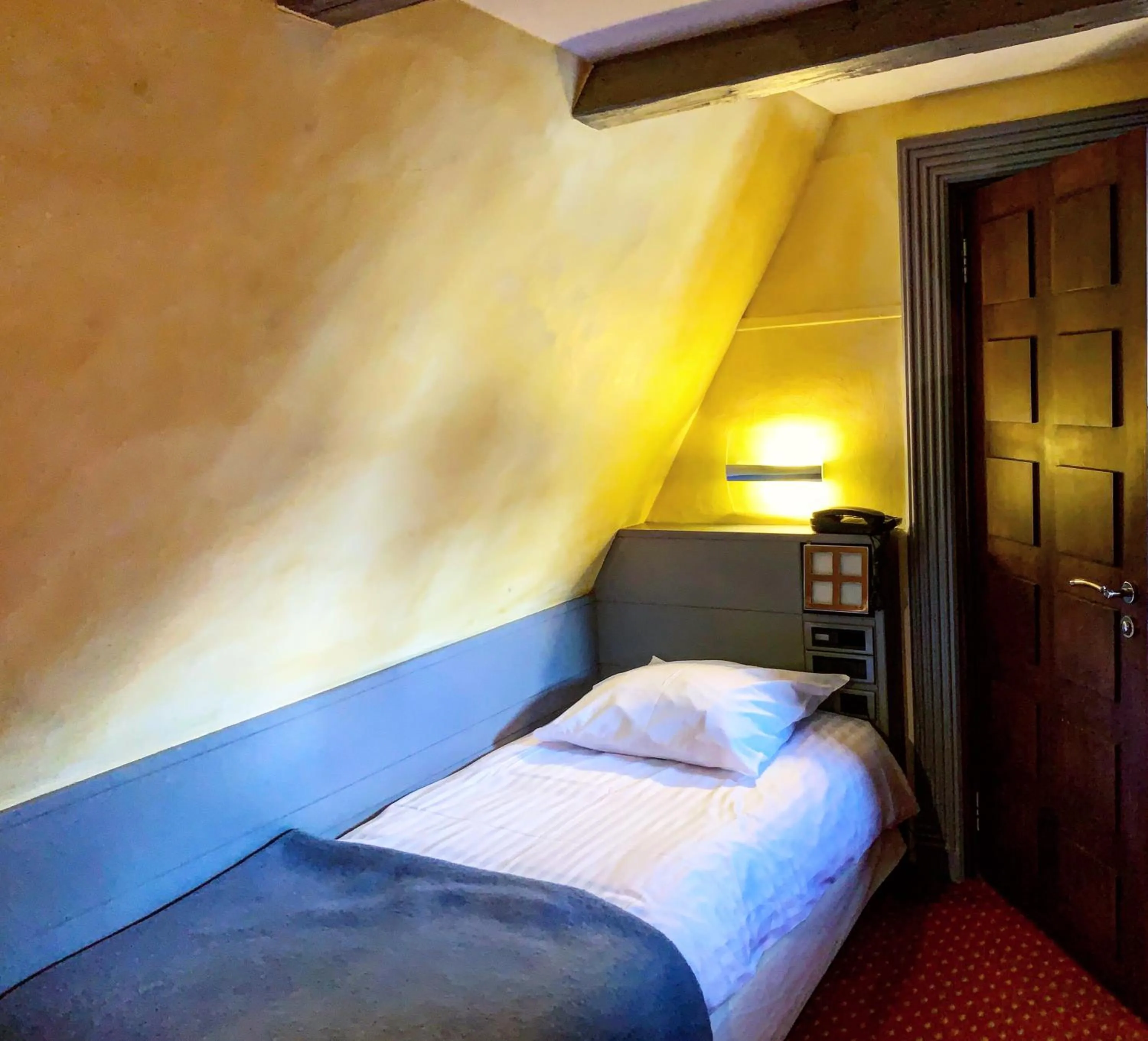 Bed in Maison Kammerzell - Hotel & Restaurant