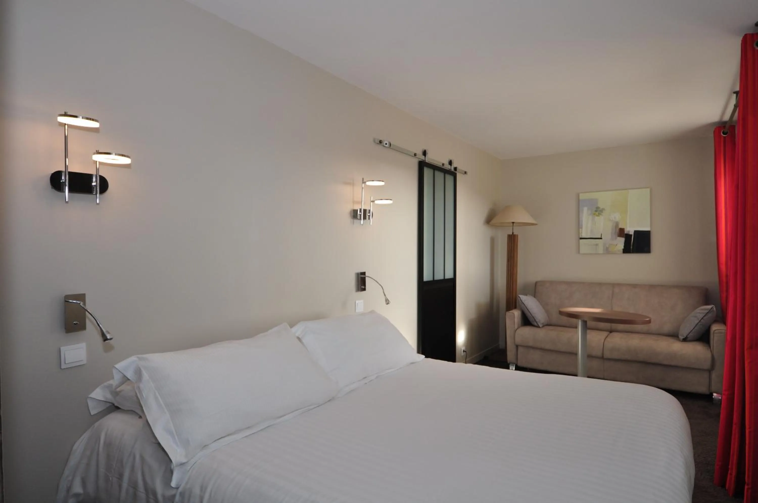 Photo of the whole room, Bed in Hôtel Le Lichen De La Mer