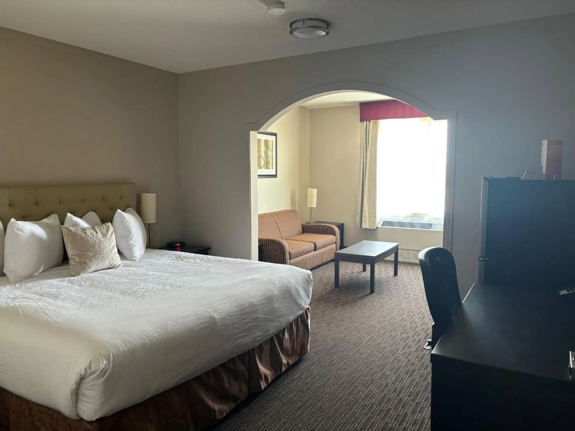 Photo of the whole room, Bed in Ramada by Wyndham Estevan