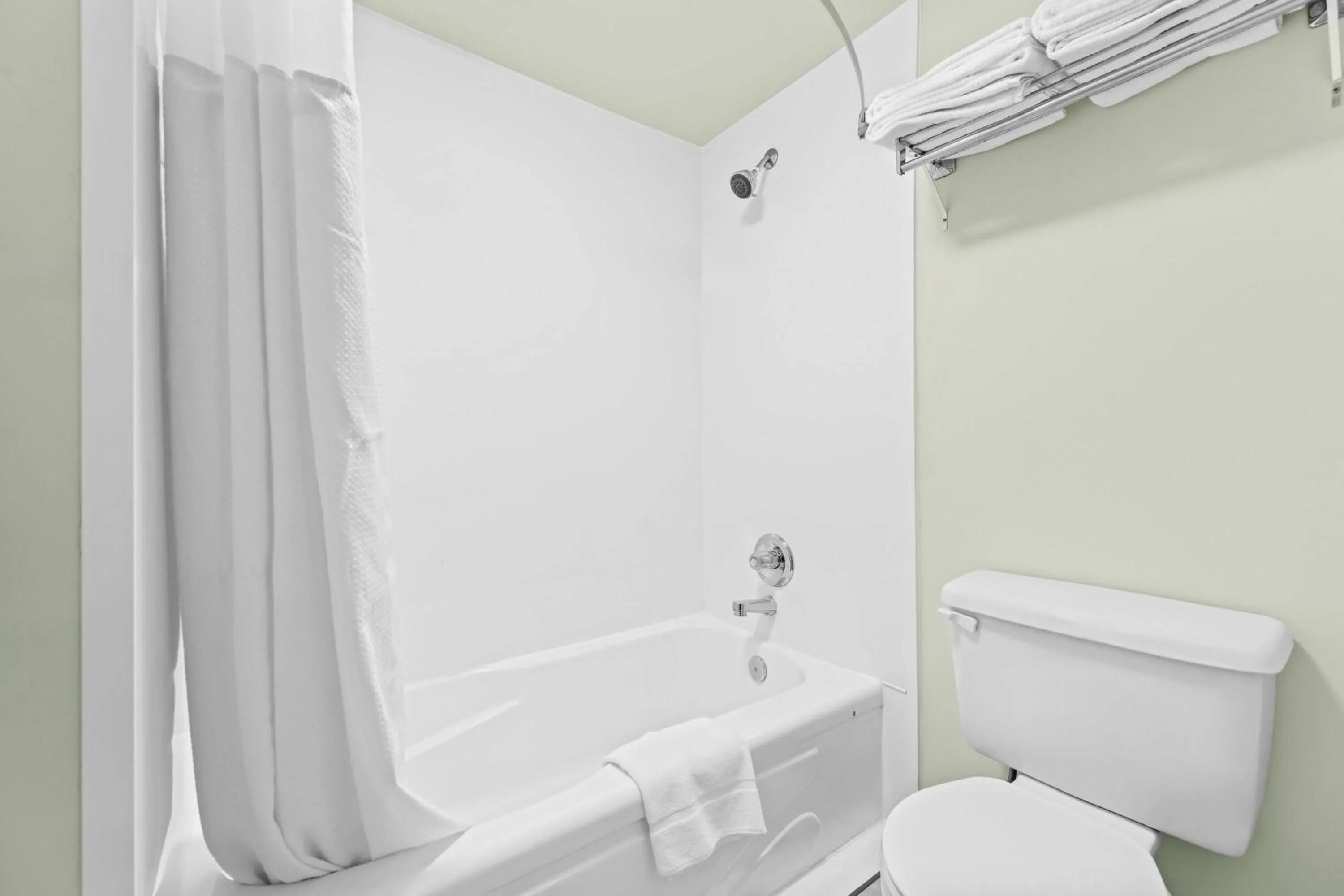 Bathroom in Super 8 by Wyndham Saskatoon Near Saskatoon Airport