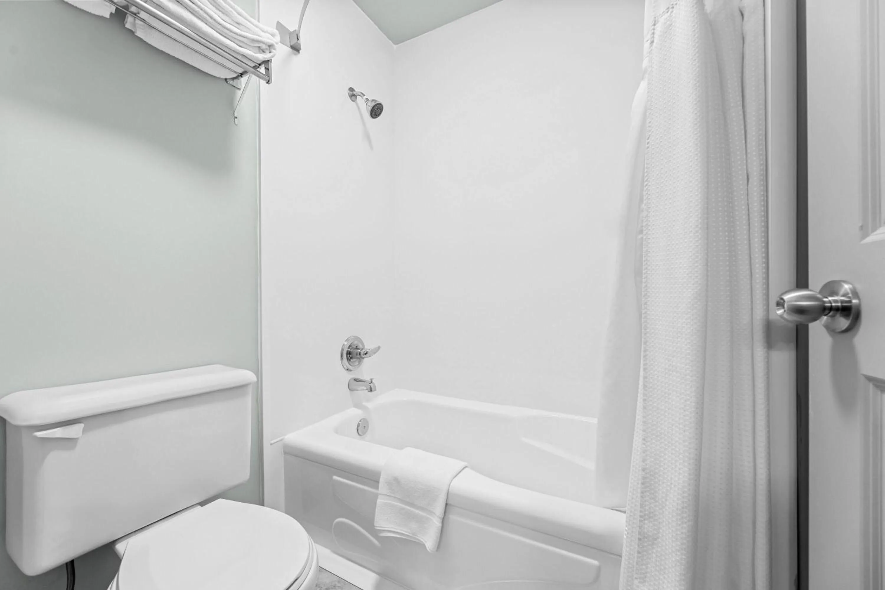 Bathroom in Super 8 by Wyndham Saskatoon Near Saskatoon Airport