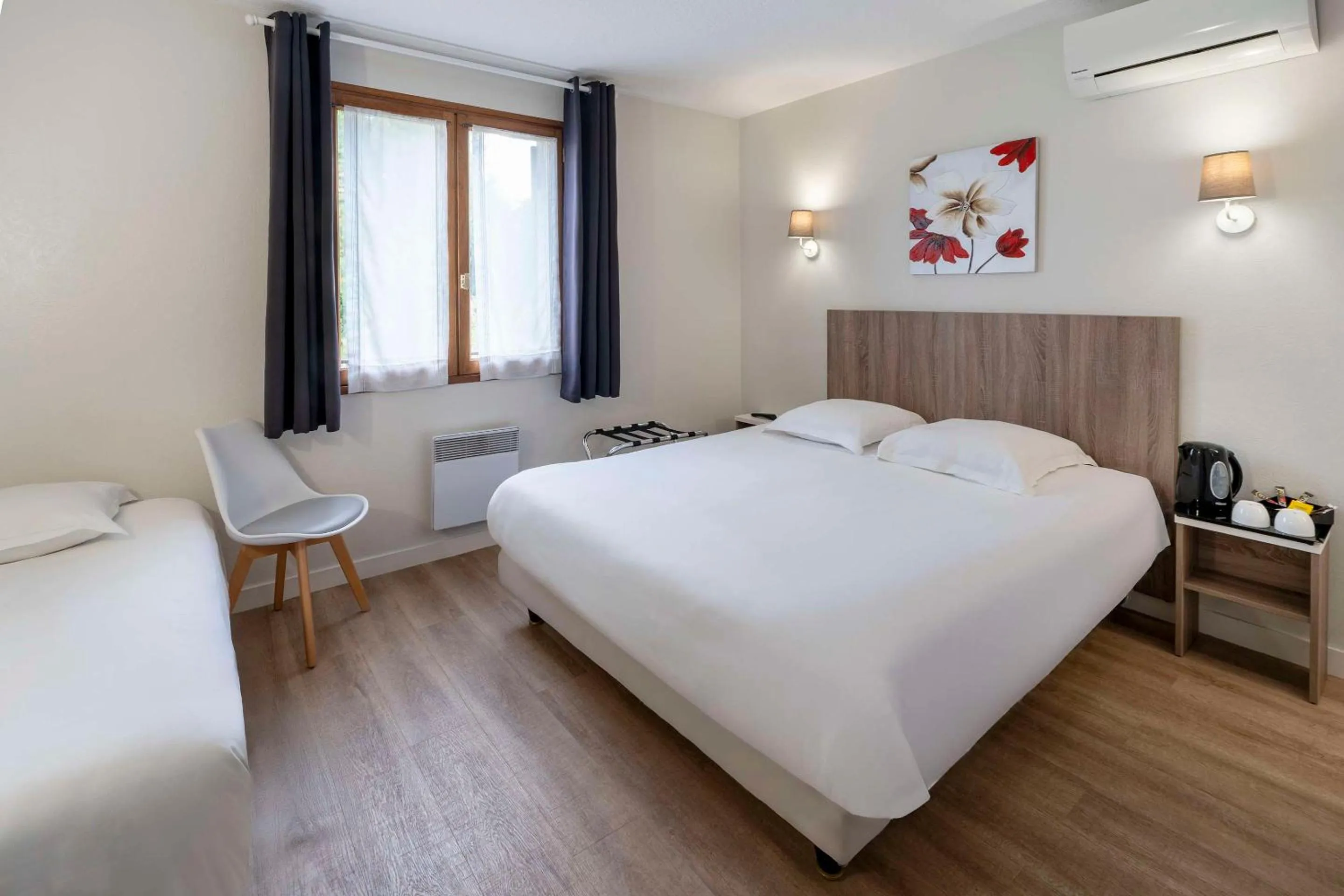 Bedroom, Bed in Sure Hotel by Best Western Saintes