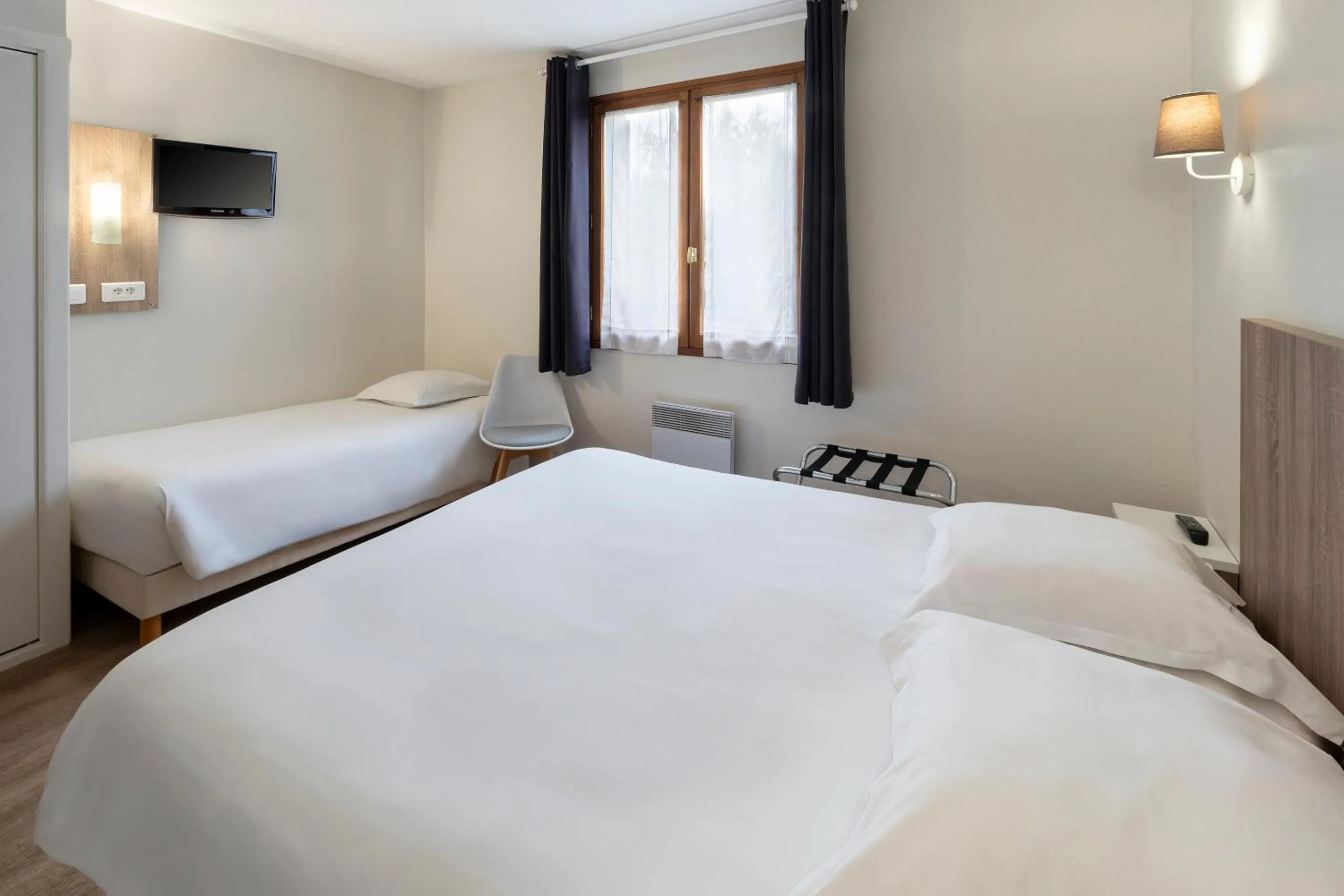 Bed in Sure Hotel by Best Western Saintes