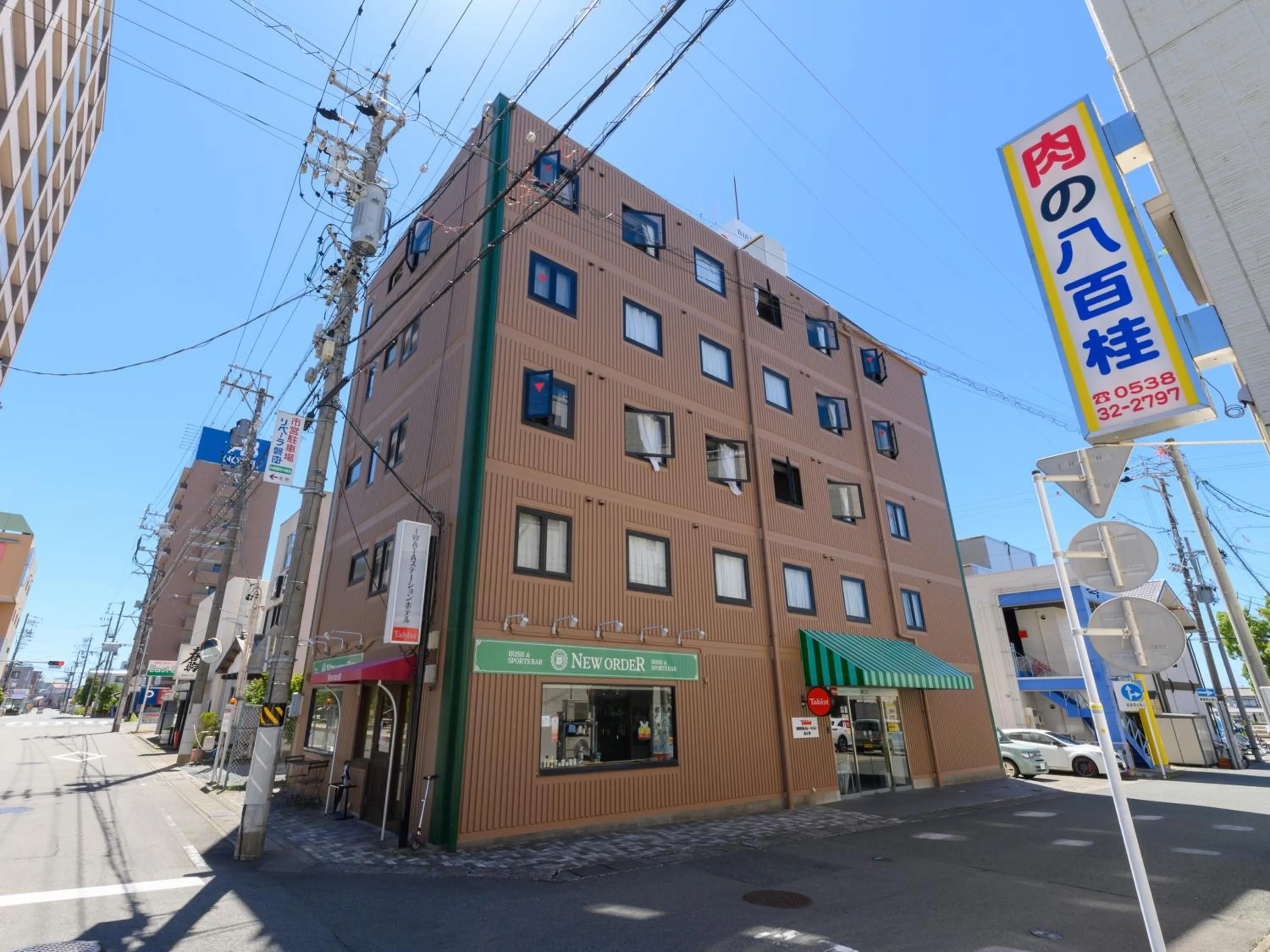 Property building in Tabist IWATA Station Hotel