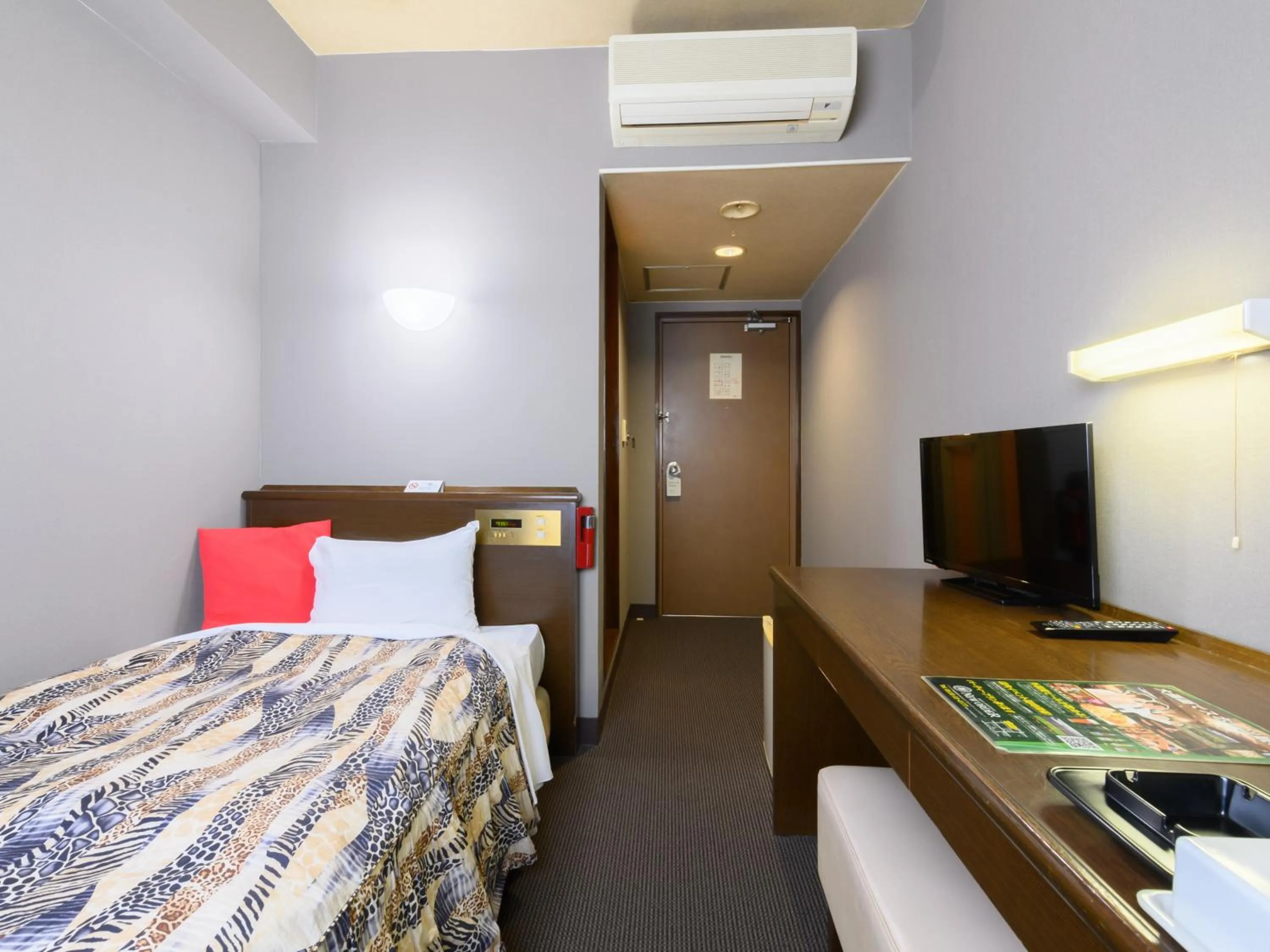 Photo of the whole room, Bed in Tabist IWATA Station Hotel