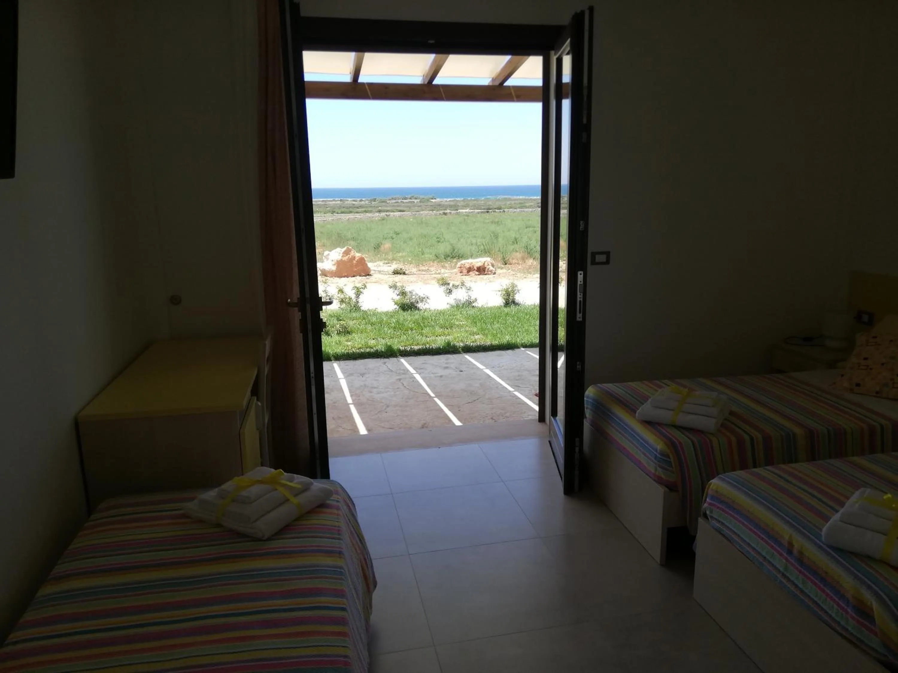 Sea view, Bed in Il giardino dei tramonti