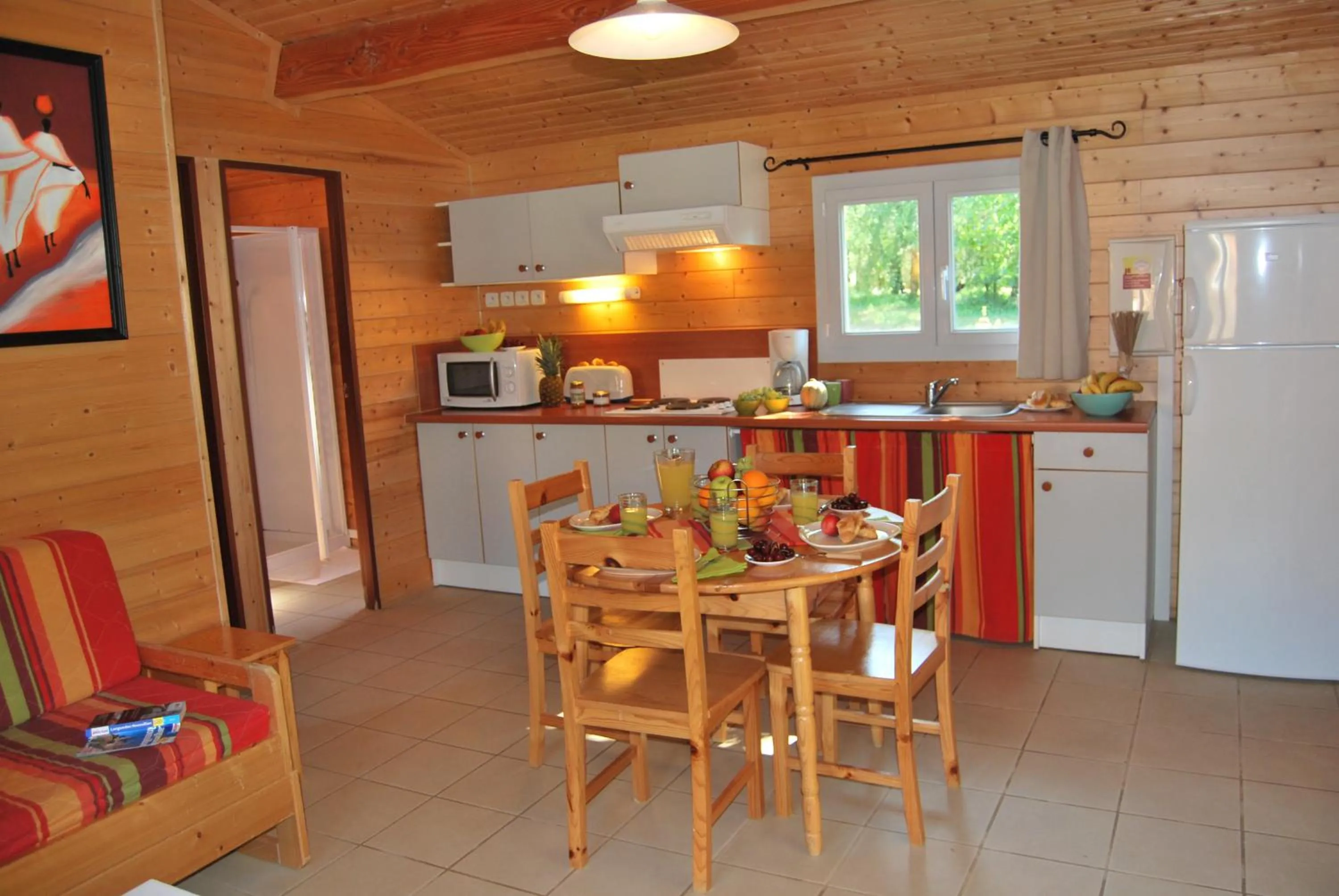 Kitchen or kitchenette in Lagrange Grand Bleu Vacances - Residence Les Ségalières