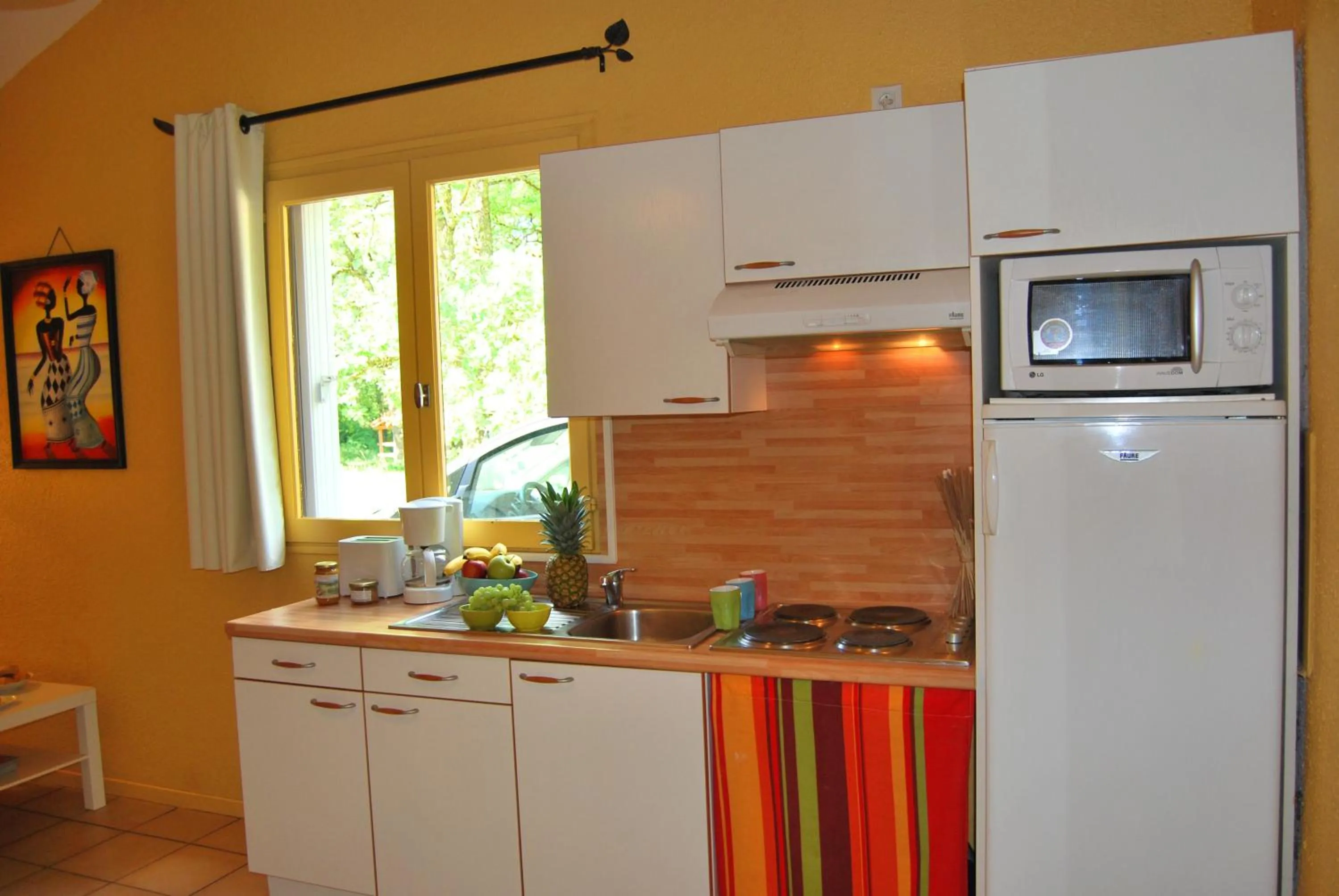 Kitchen or kitchenette in Lagrange Grand Bleu Vacances - Residence Les Ségalières