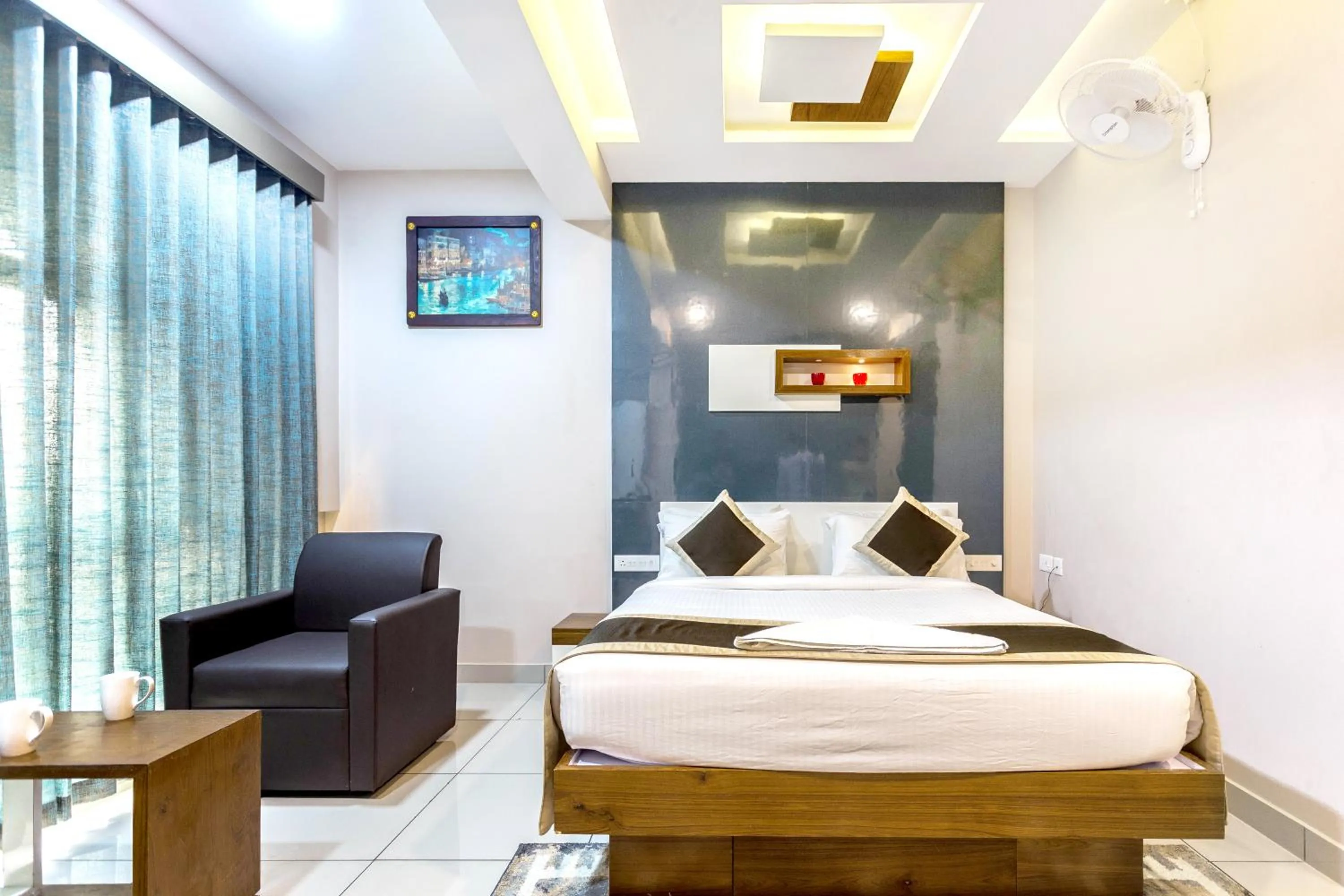 Photo of the whole room, Bed in Nextel Inn, Calicut