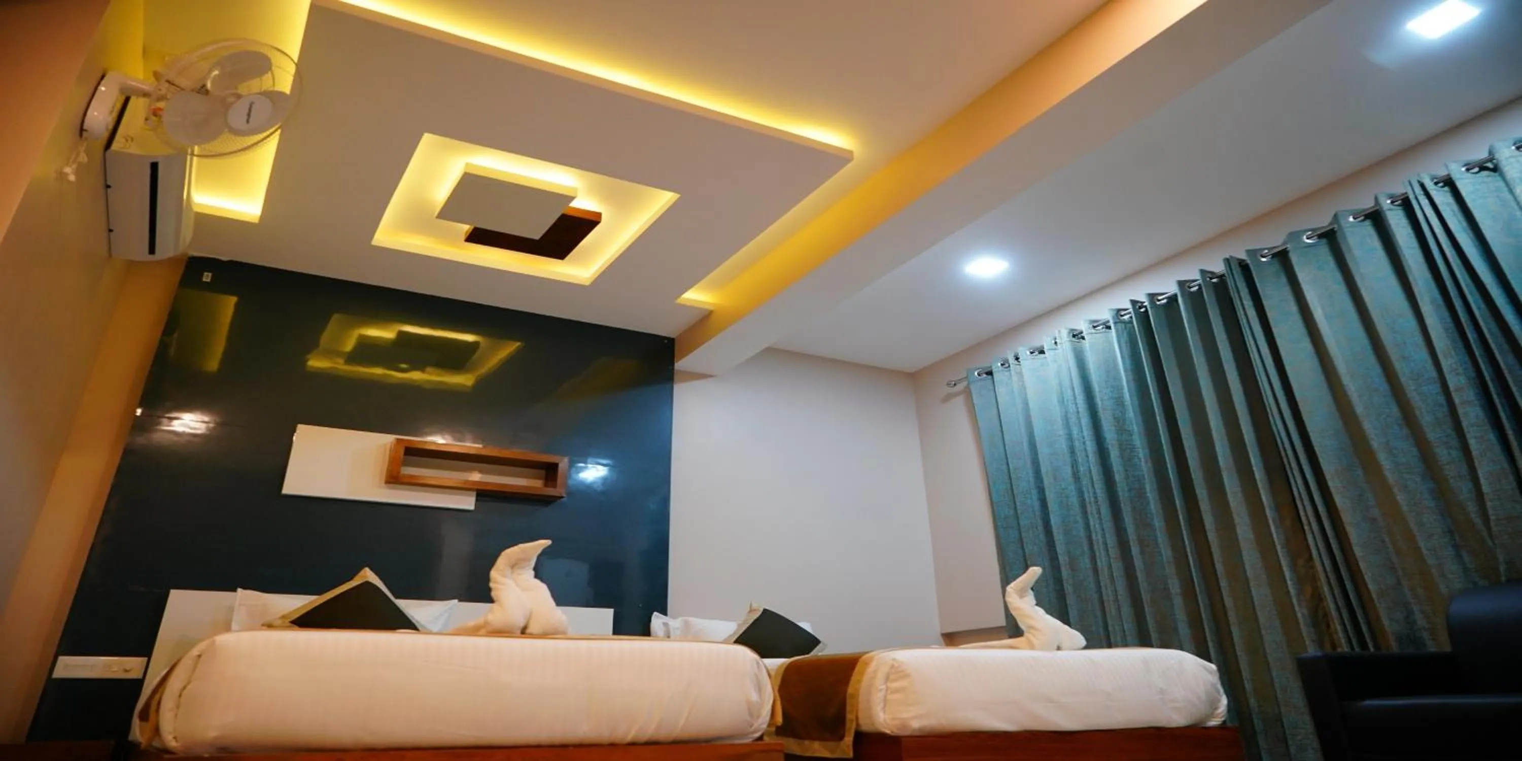 Bed in Nextel Inn, Calicut