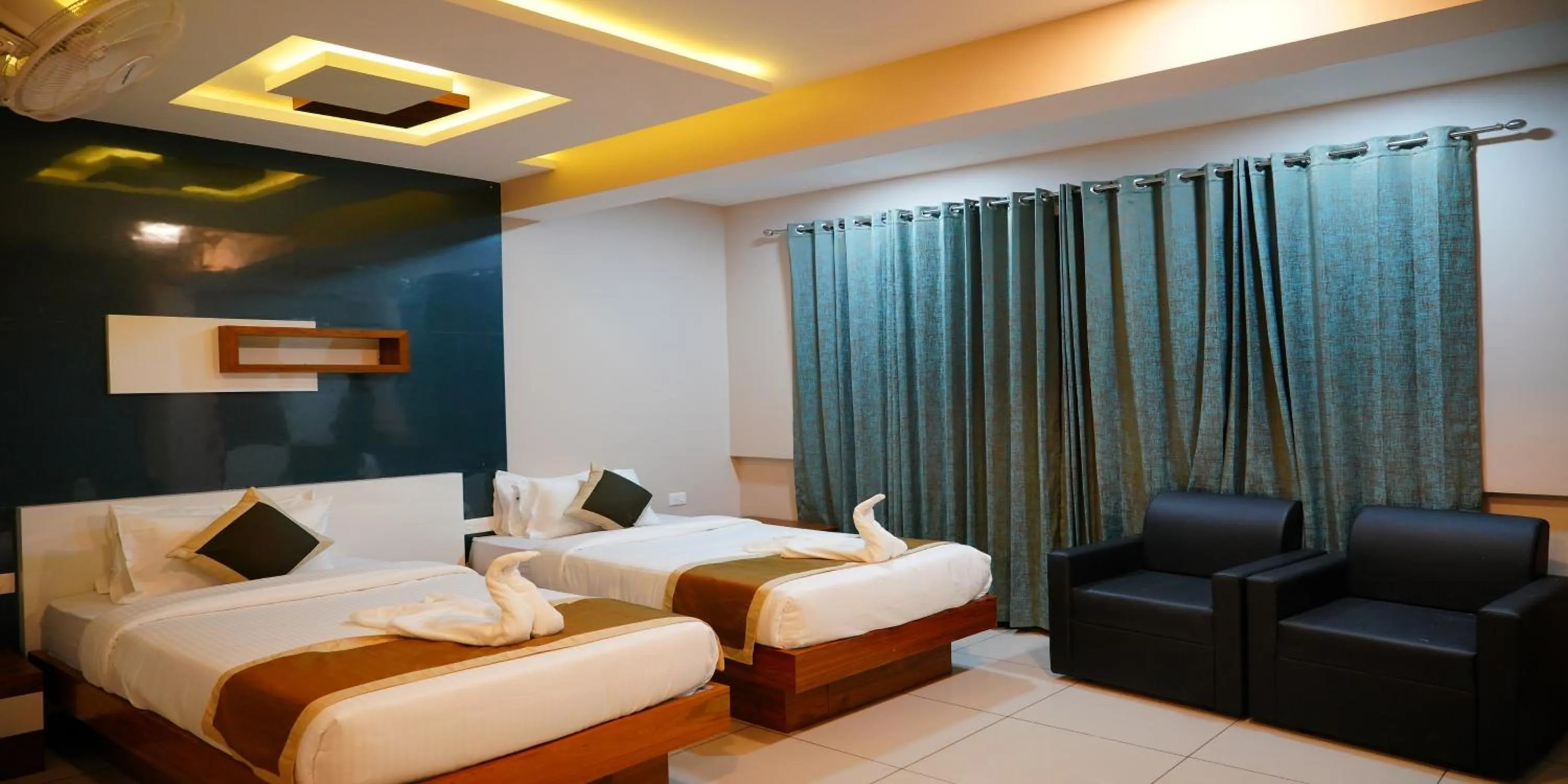 Bed in Nextel Inn, Calicut