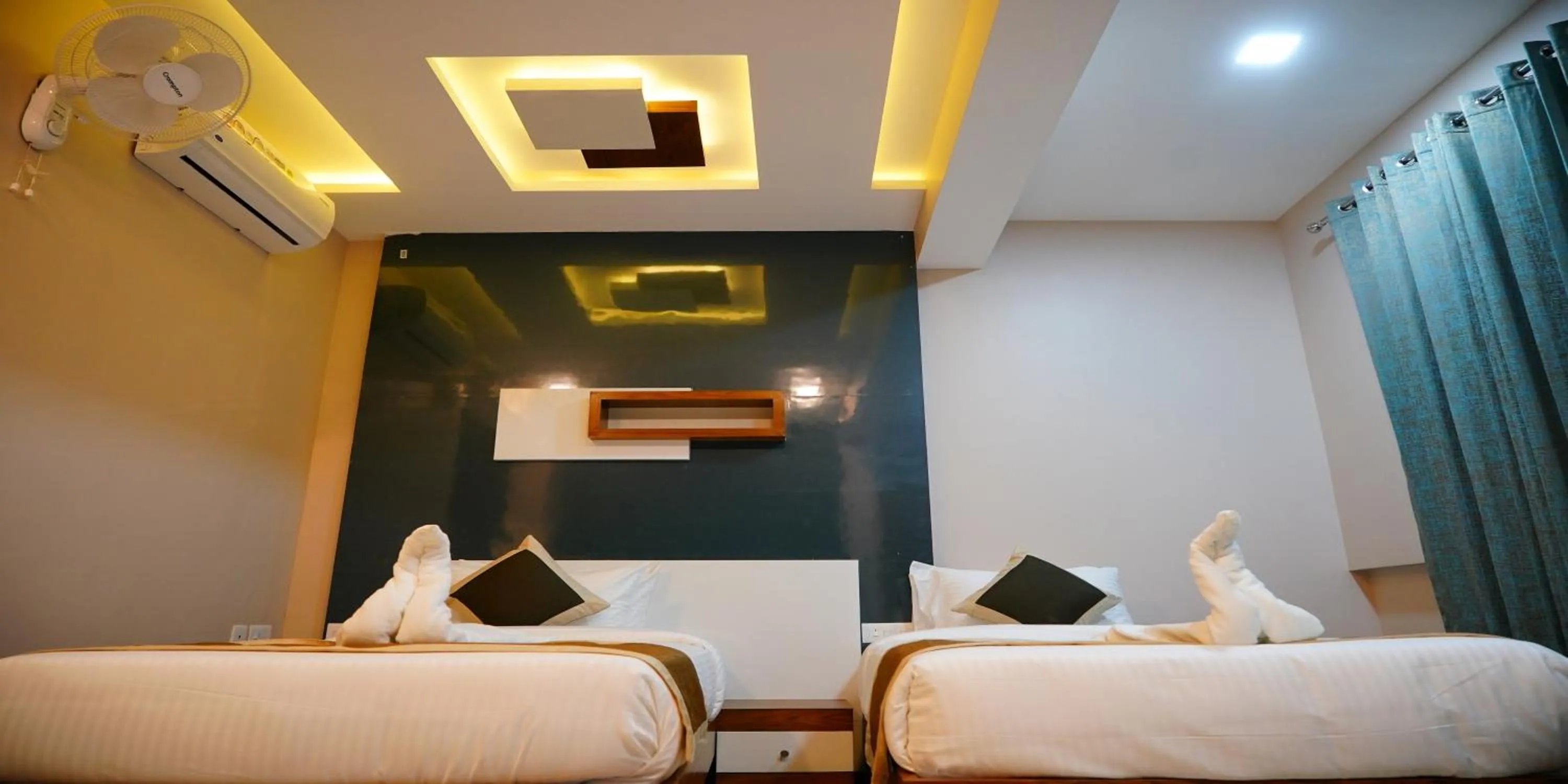 Bed in Nextel Inn, Calicut