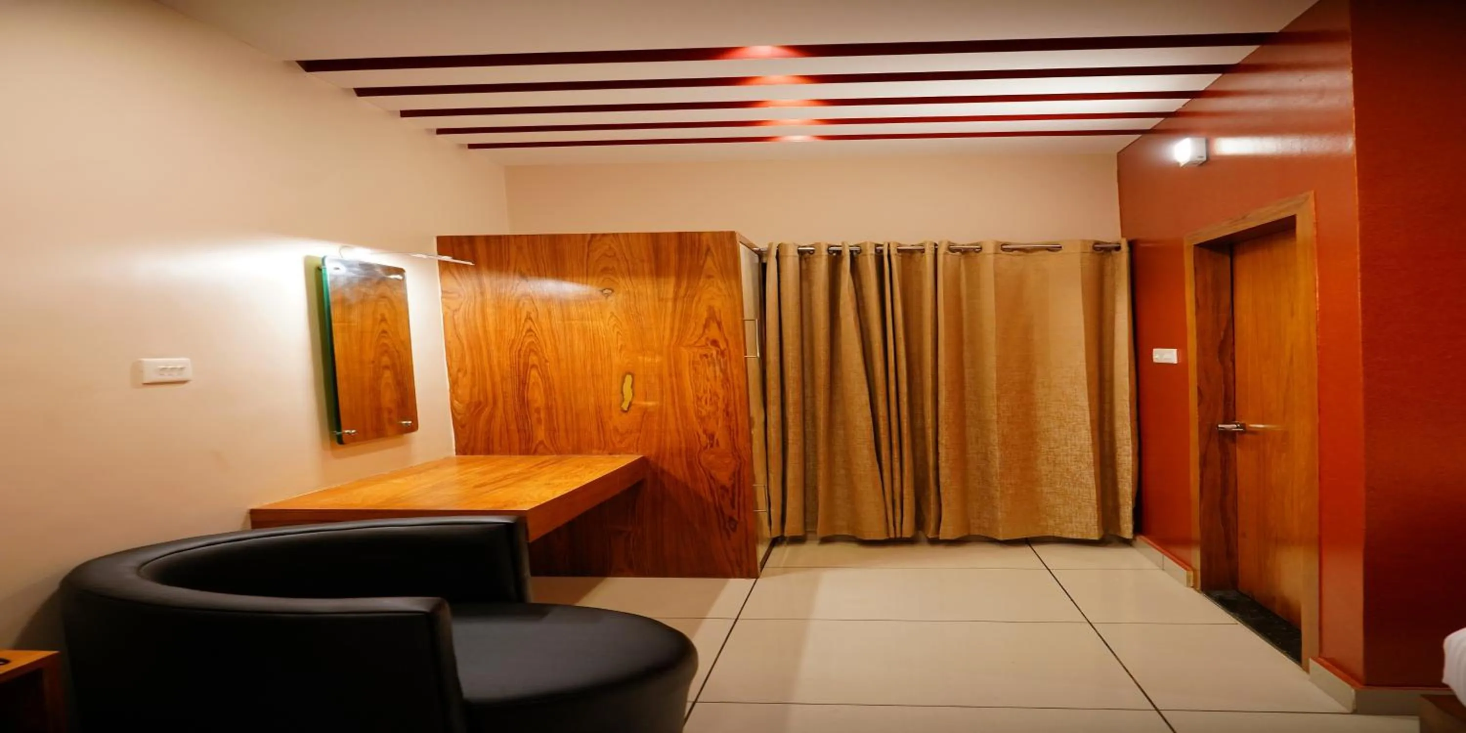 Bed in Nextel Inn, Calicut