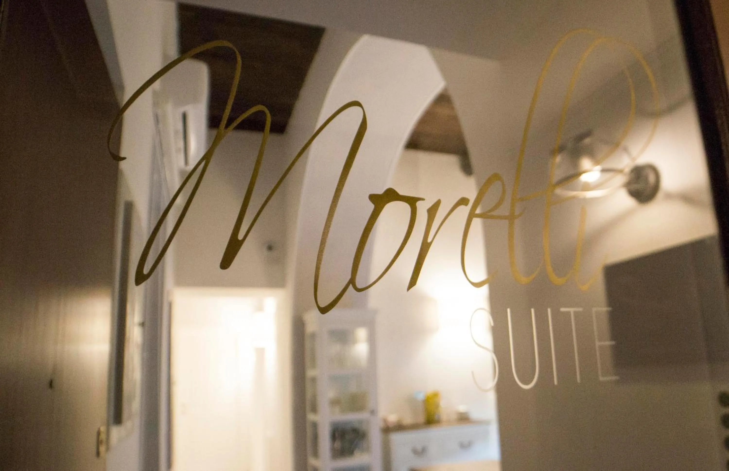 Property logo or sign in Morelli suite