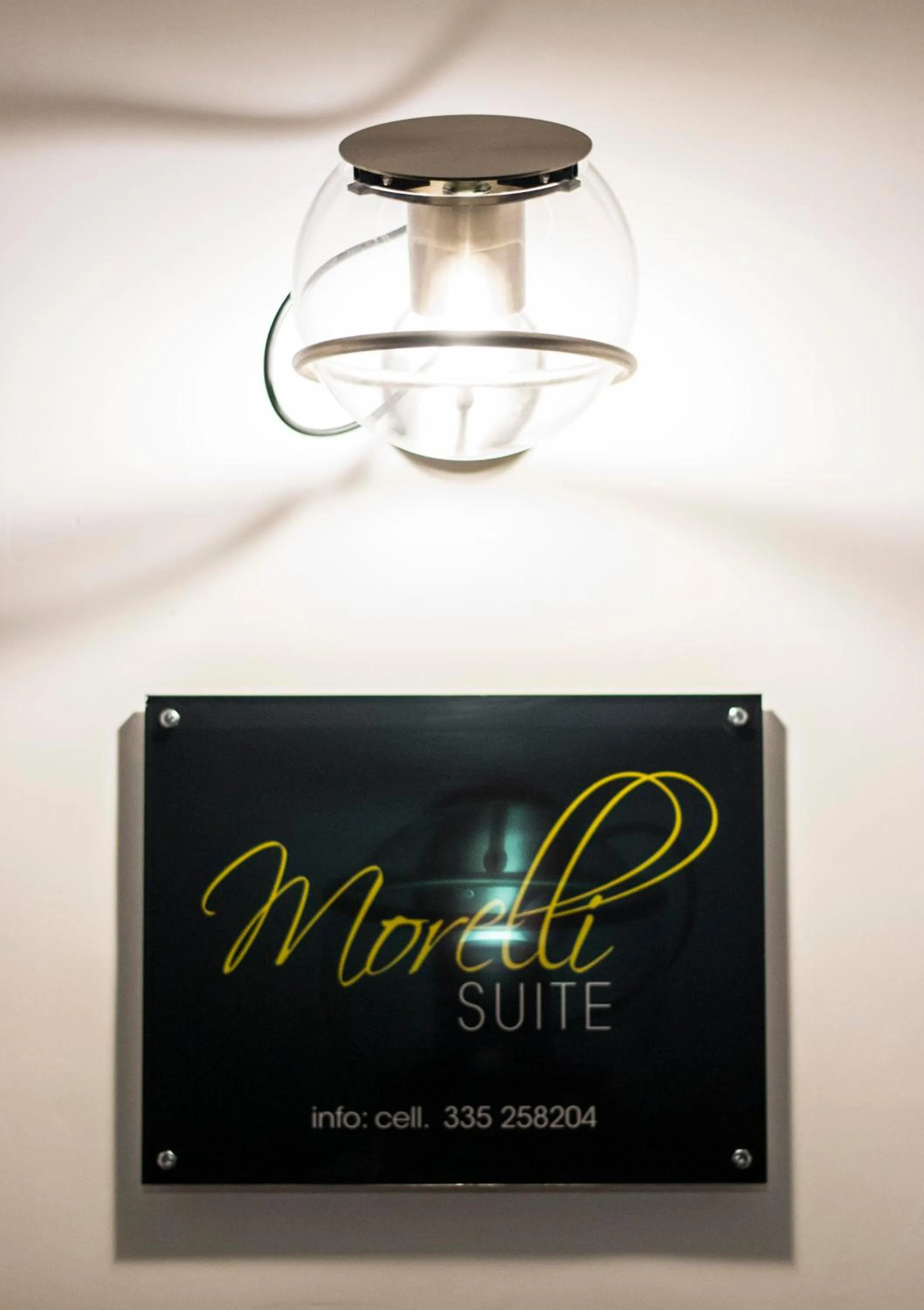Property logo or sign in Morelli suite