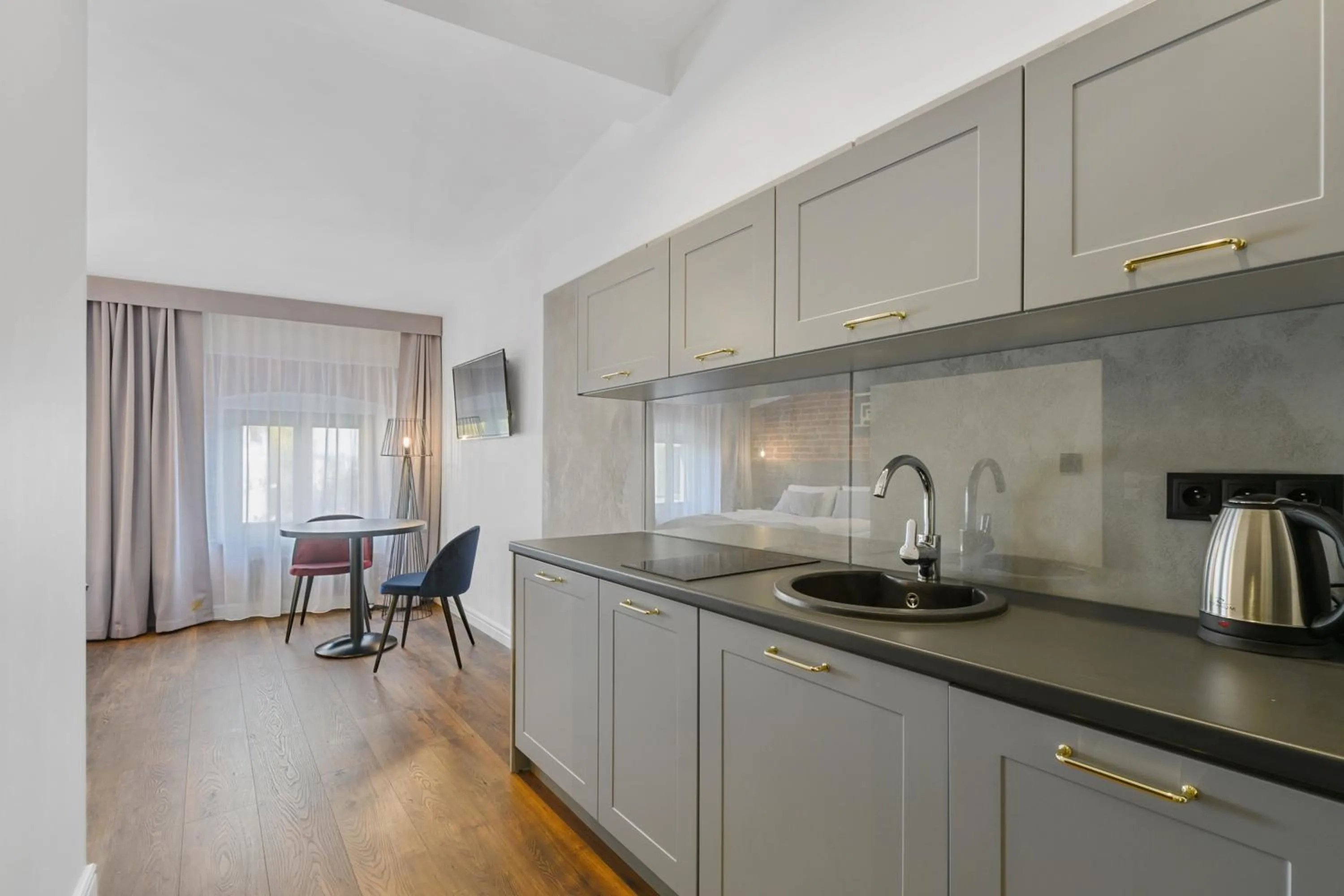 Kitchen or kitchenette in Aparthotel Krzywa Kamienica