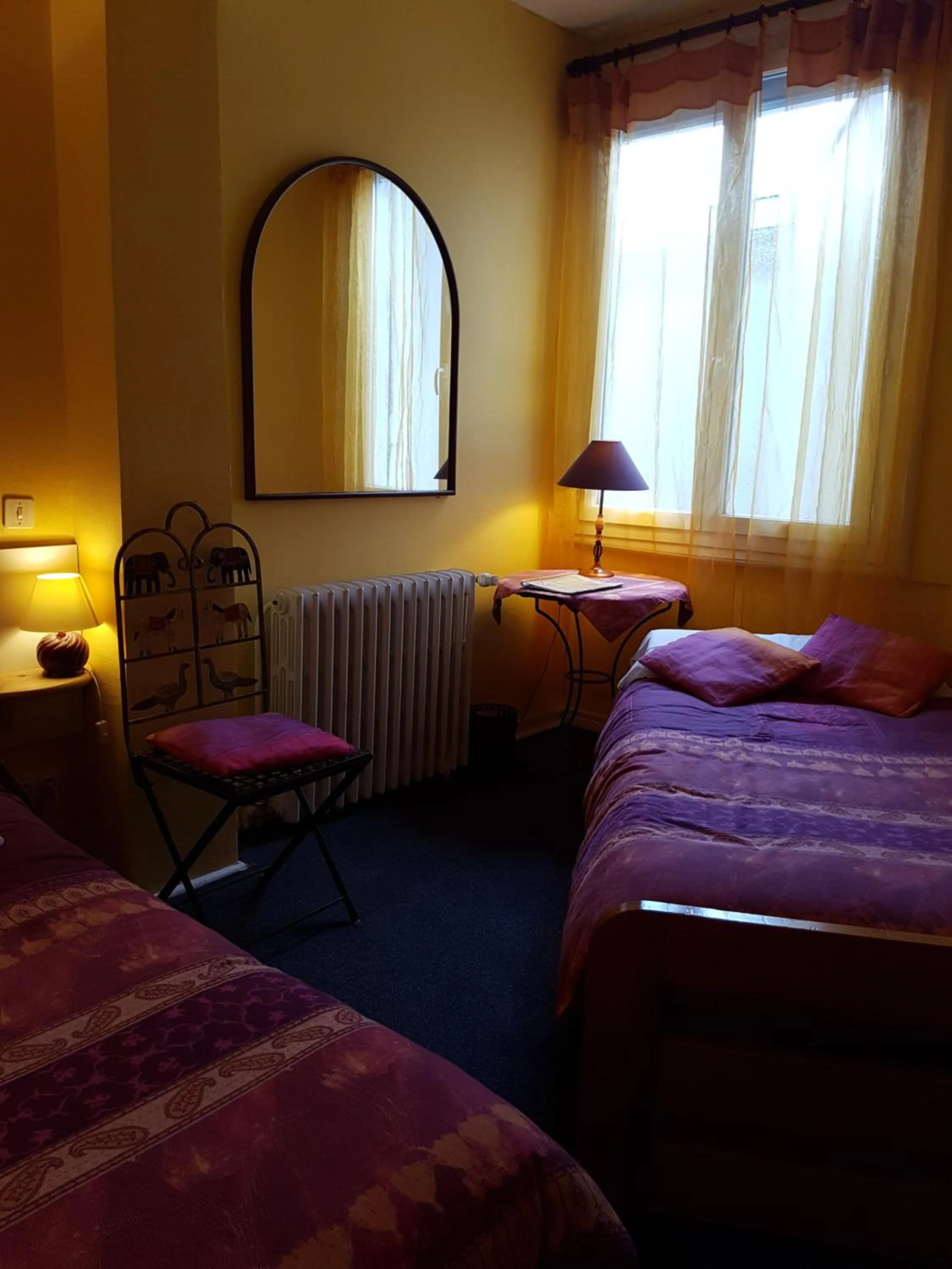 Bed in Hôtel du Centre