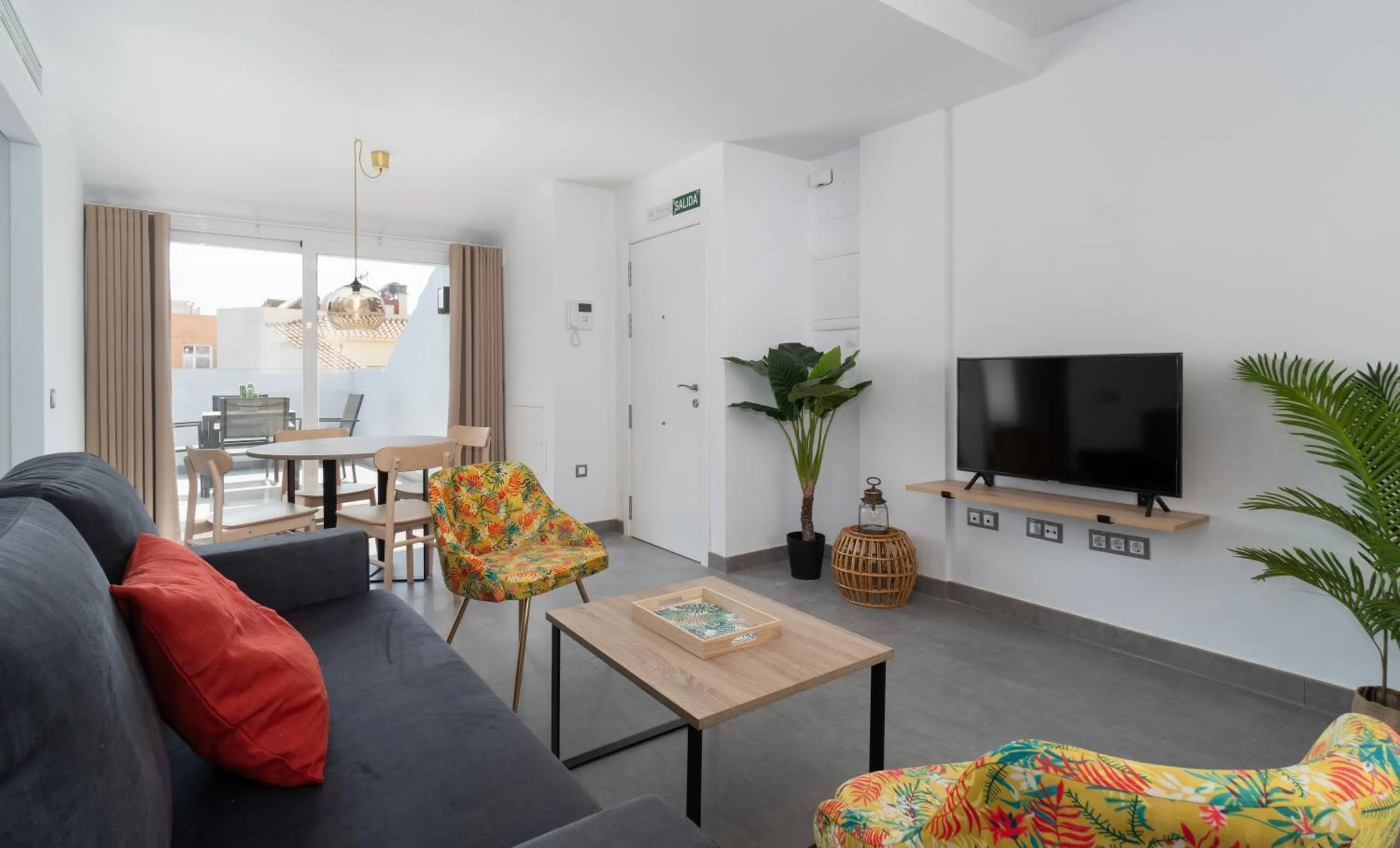 TV and multimedia in Sur Suites La Dorada, centricos soleados a pocos metros de la Playa y con Parking Opcional