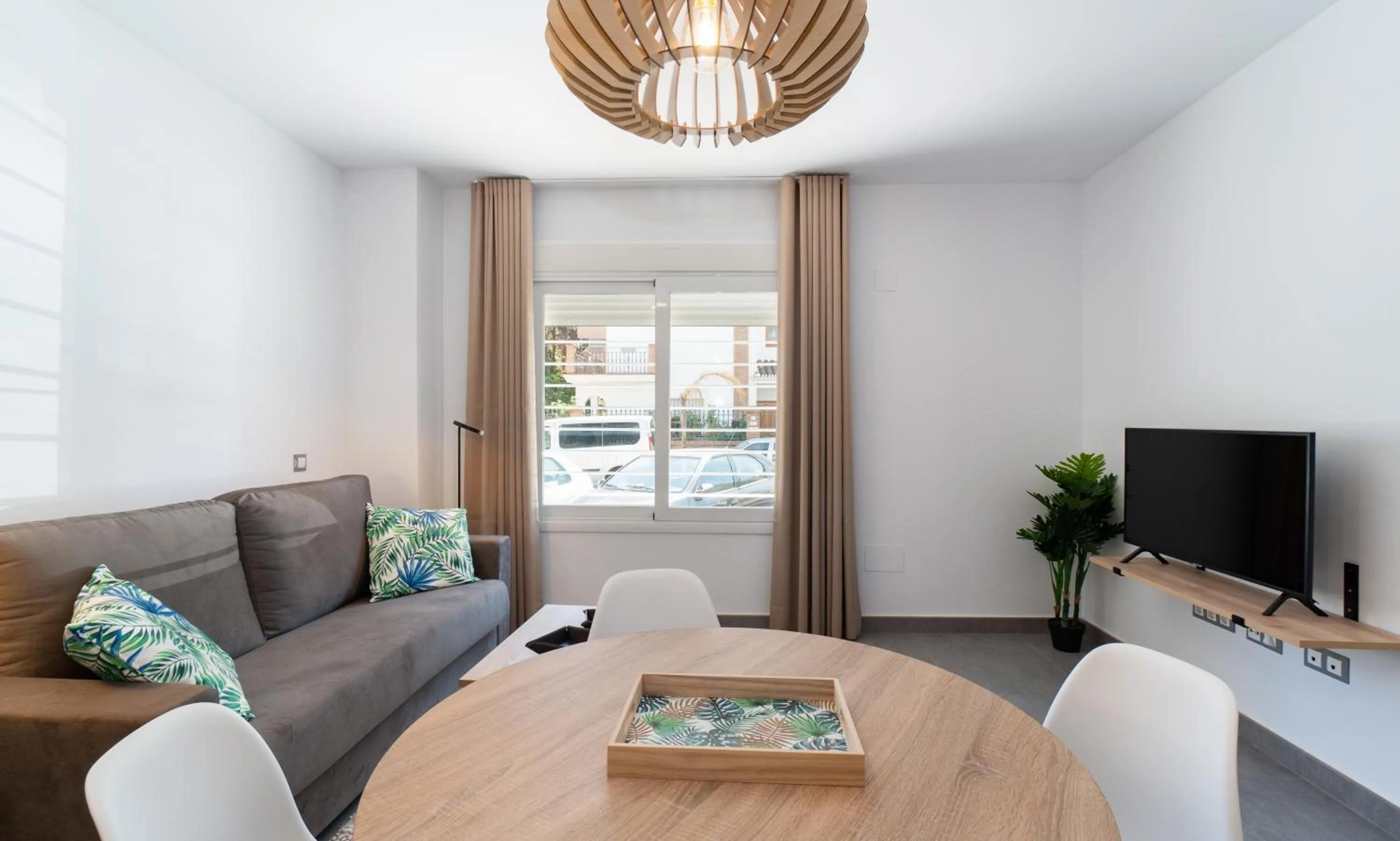 TV and multimedia in Sur Suites La Dorada, centricos soleados a pocos metros de la Playa y con Parking Opcional