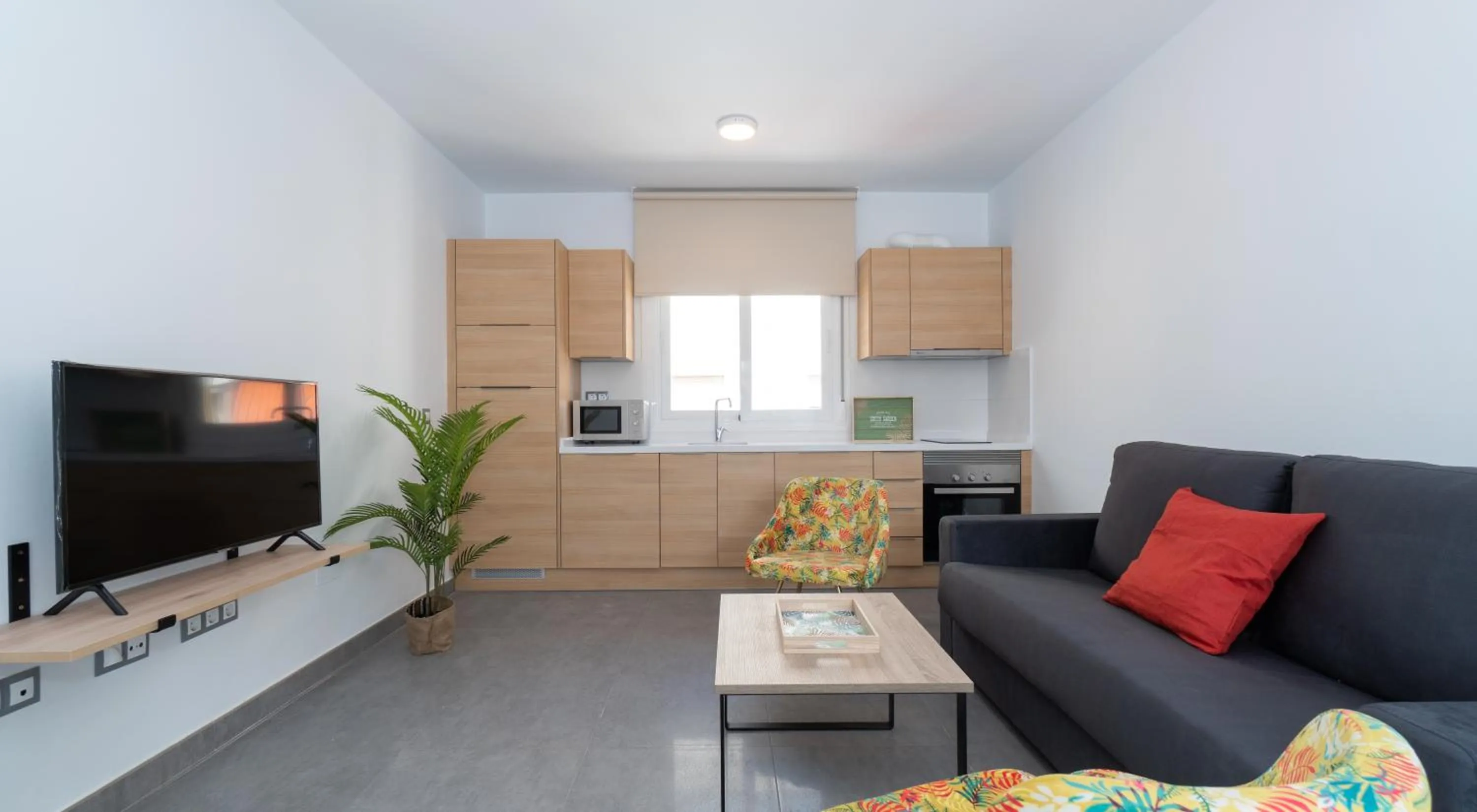 TV and multimedia in Sur Suites La Dorada, centricos soleados a pocos metros de la Playa y con Parking Opcional