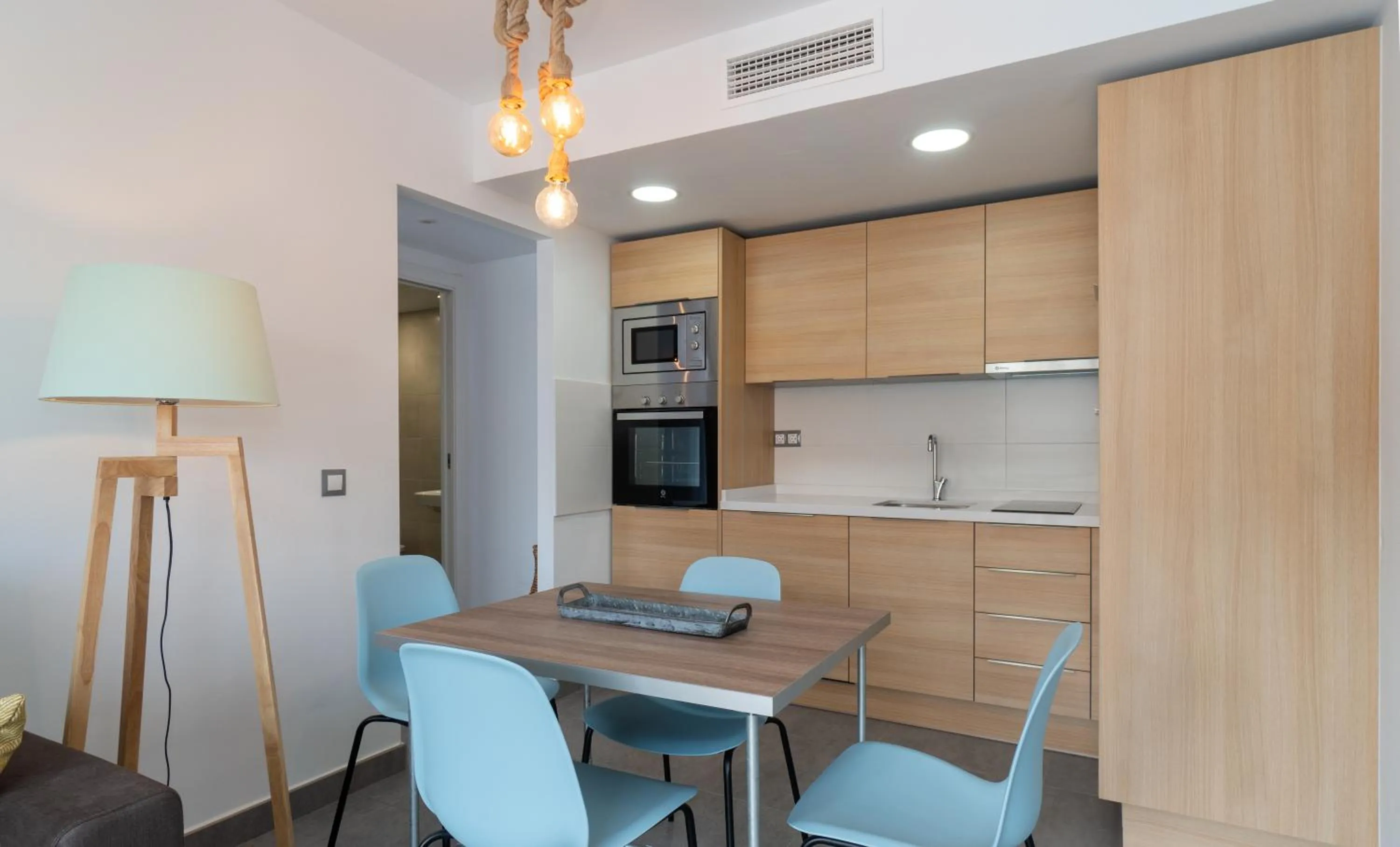 Kitchen or kitchenette in Sur Suites La Dorada, centricos soleados a pocos metros de la Playa y con Parking Opcional