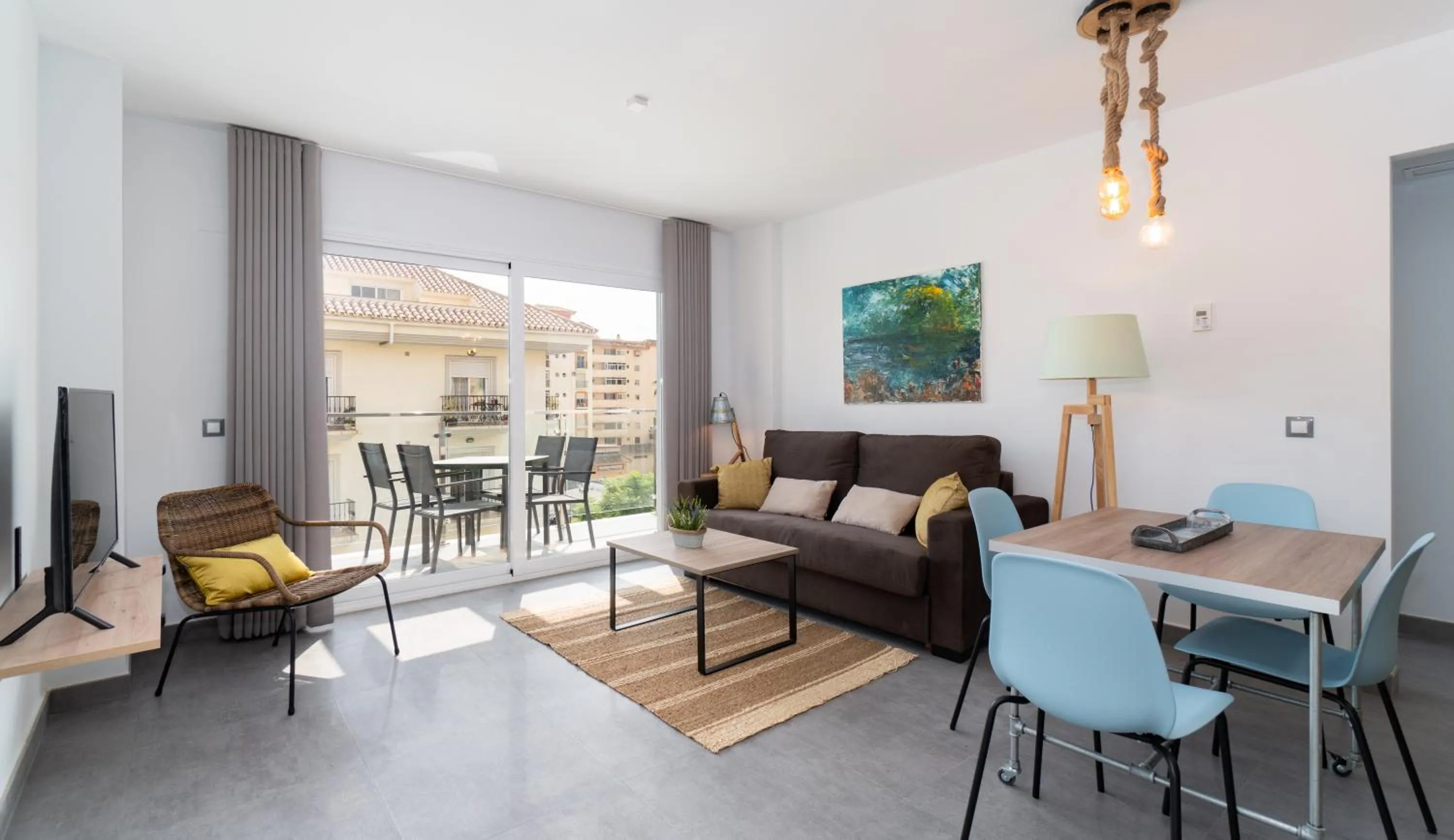 Living room in Sur Suites La Dorada, centricos soleados a pocos metros de la Playa y con Parking Opcional