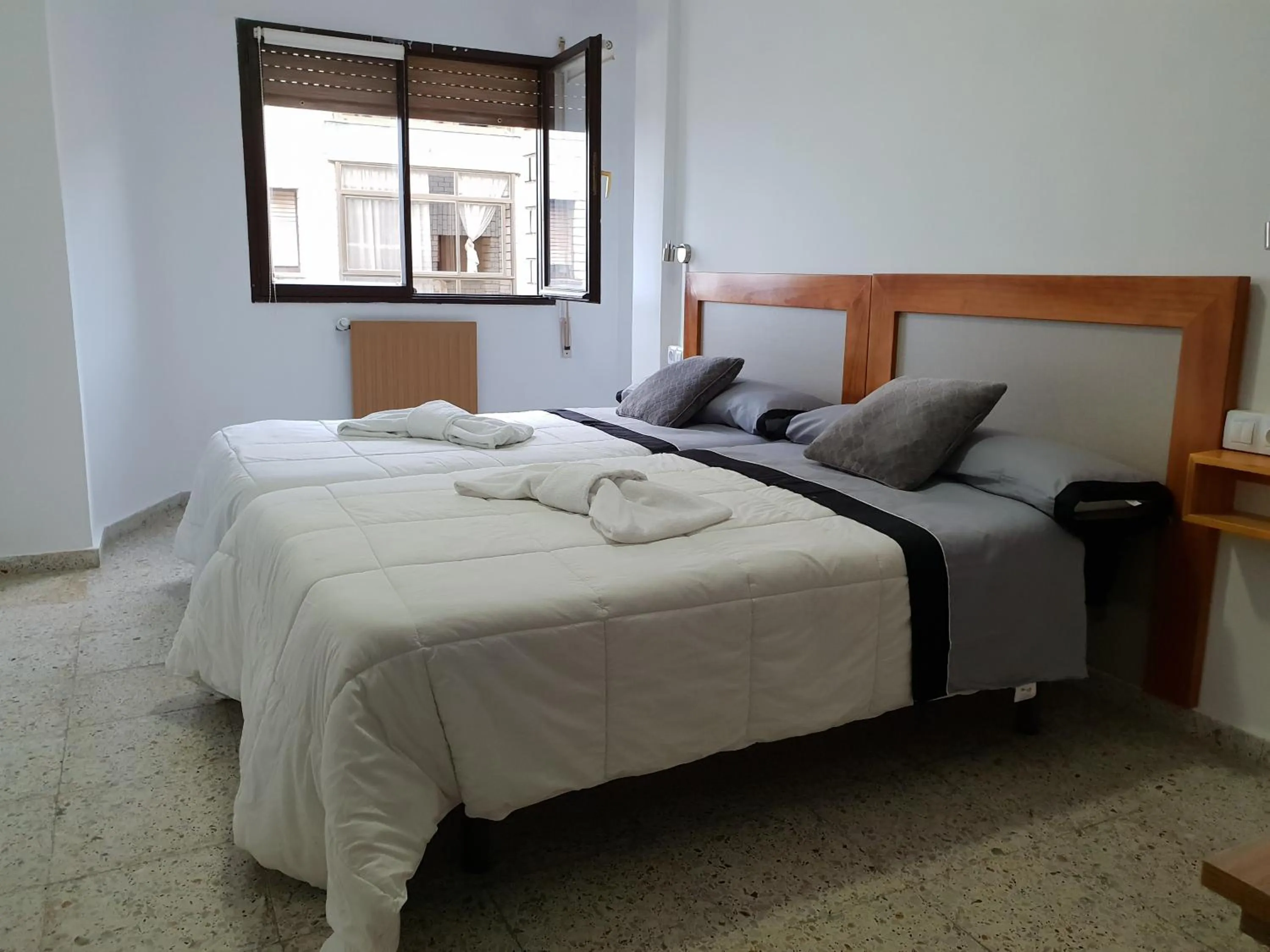 Bed in Apartamentos O Cargadeiro Ribadeo