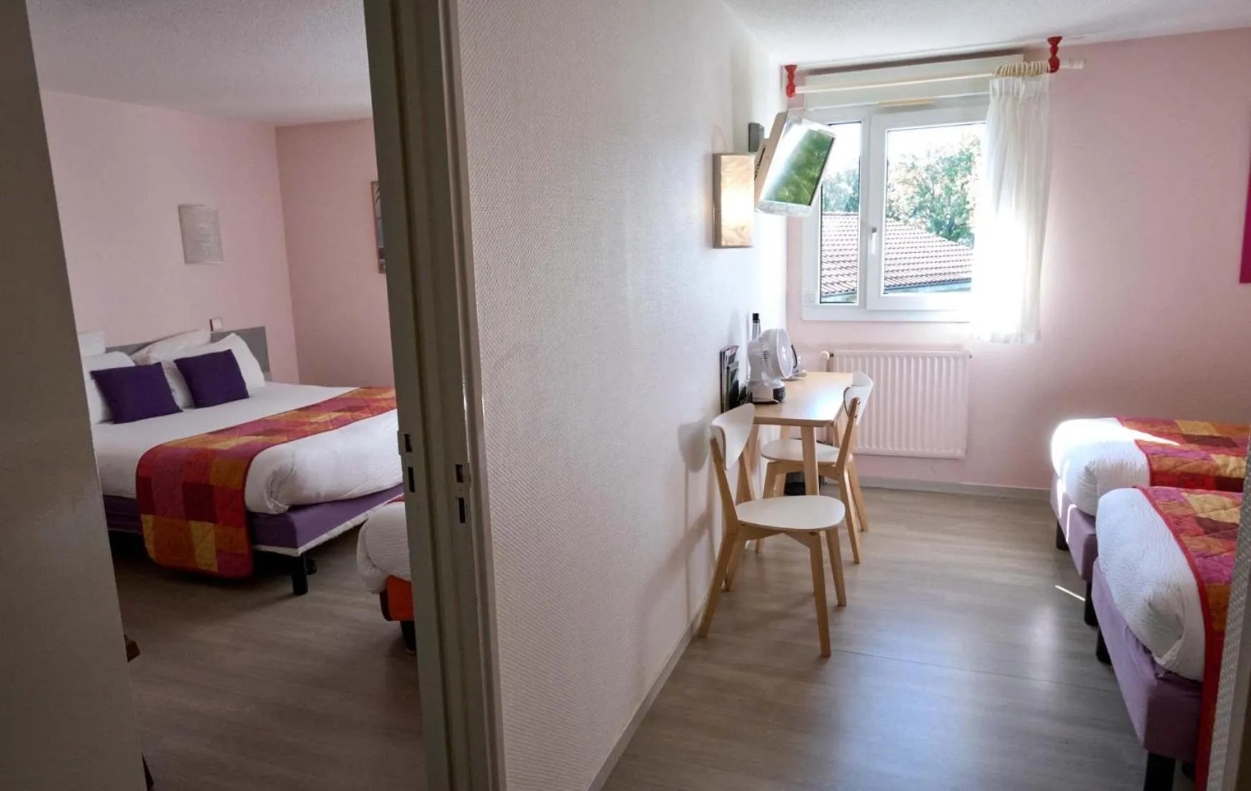 Bed in LOGIS Hôtel Le Moulin Des Gardelles