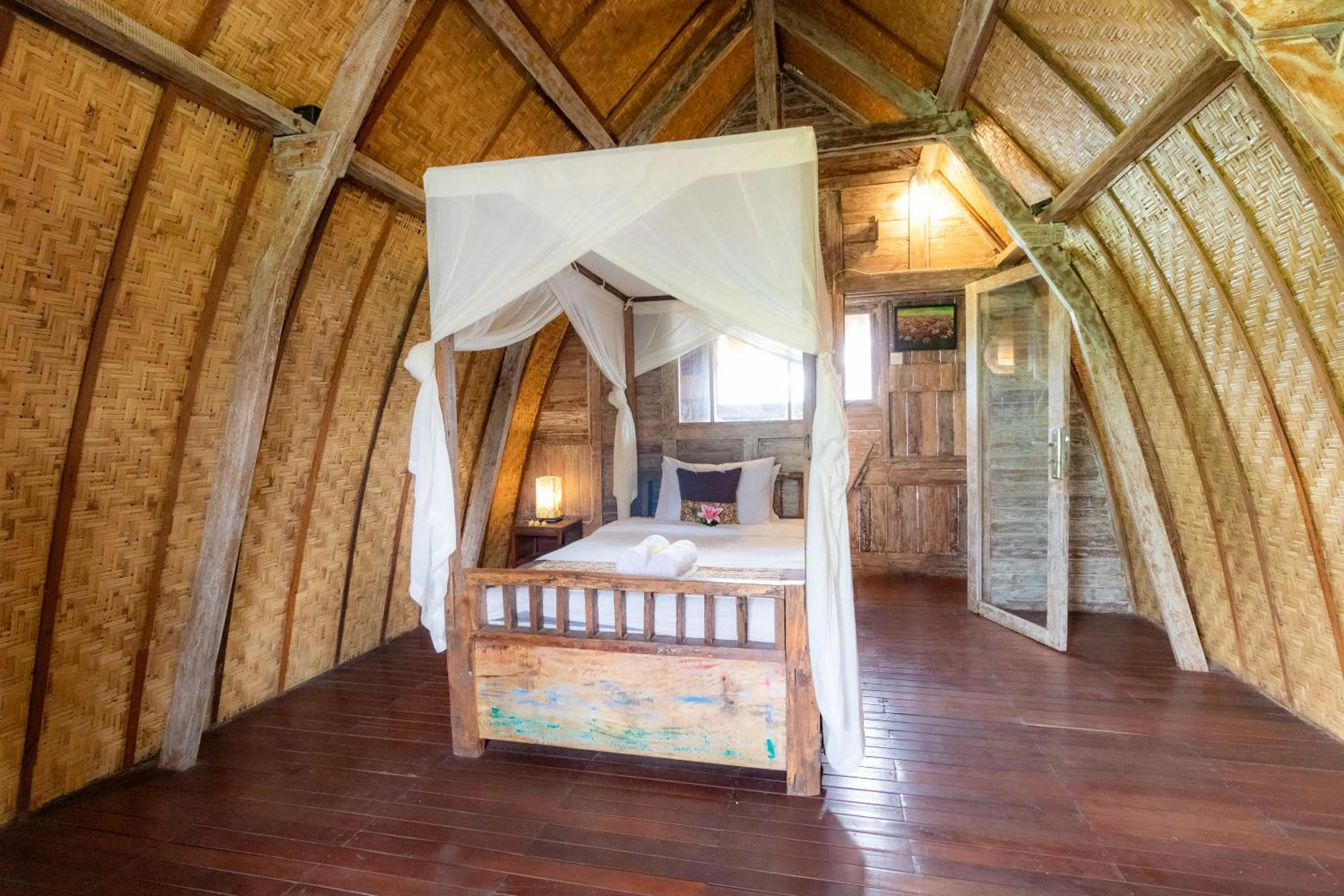 Bed in Royal JJ Ubud Resort & Spa