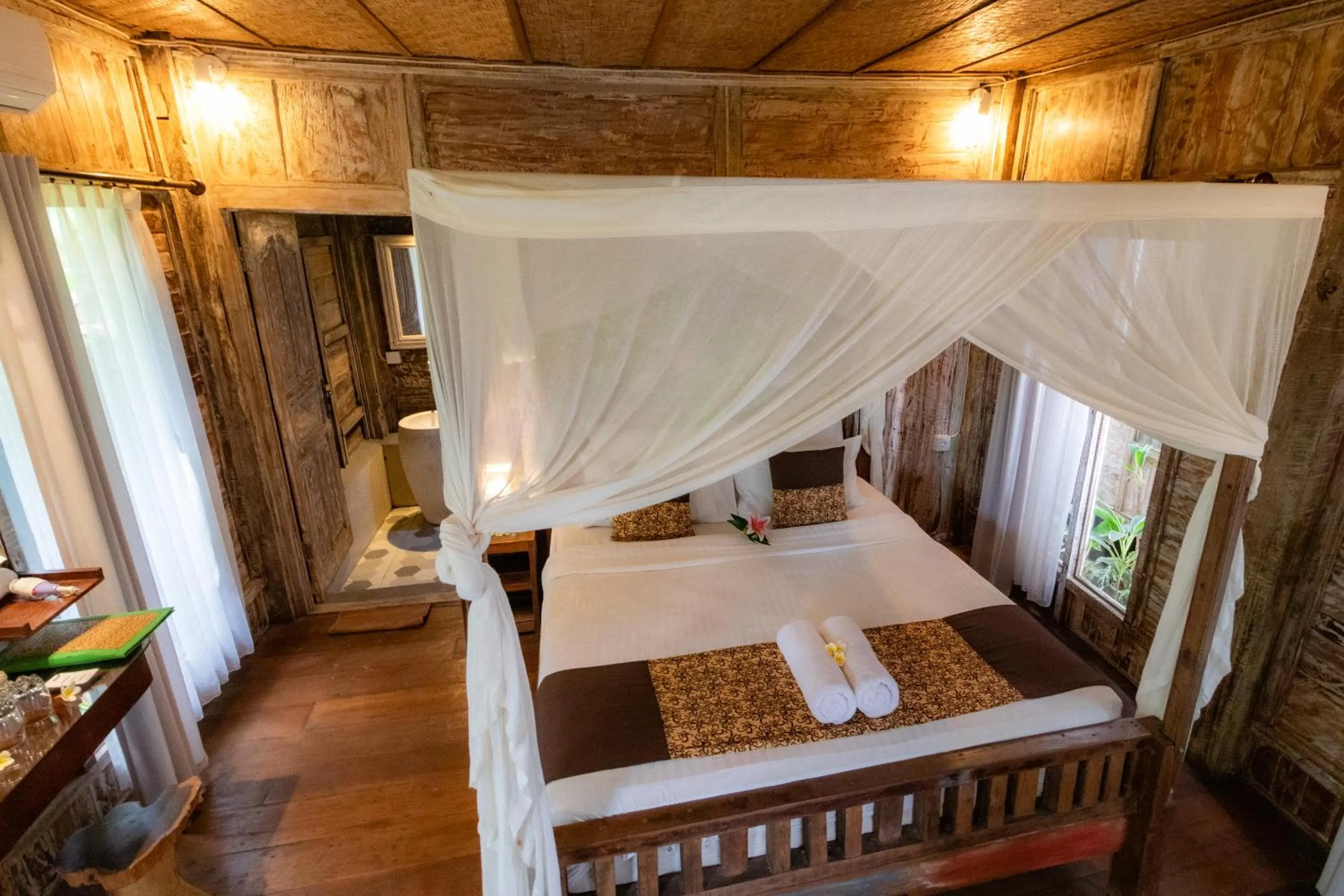 Bed in Royal JJ Ubud Resort & Spa