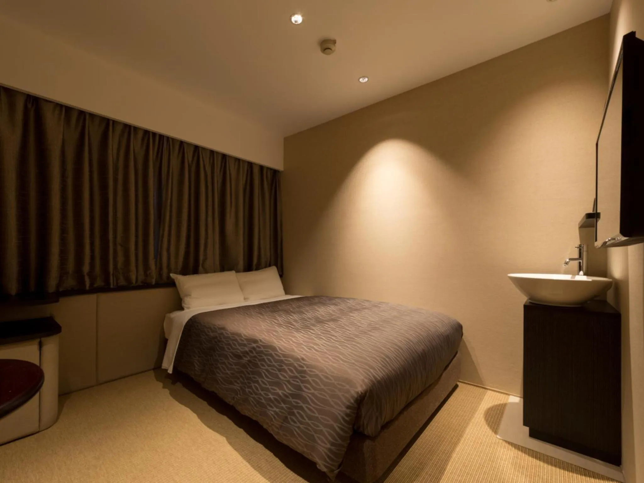 Photo of the whole room, Bed in THE HOTELS HAKATA KASANE Bayside