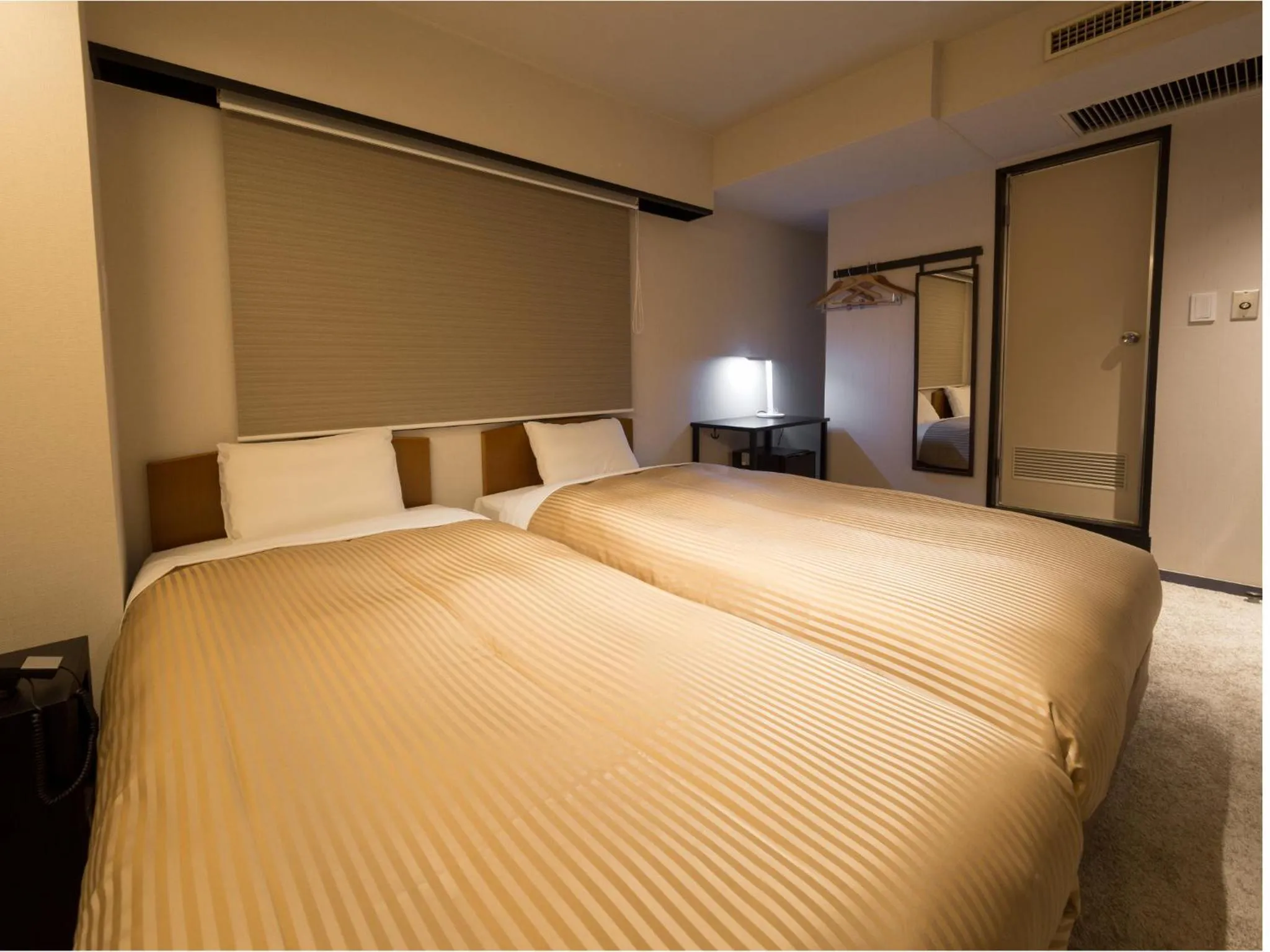 Photo of the whole room, Bed in THE HOTELS HAKATA KASANE Bayside