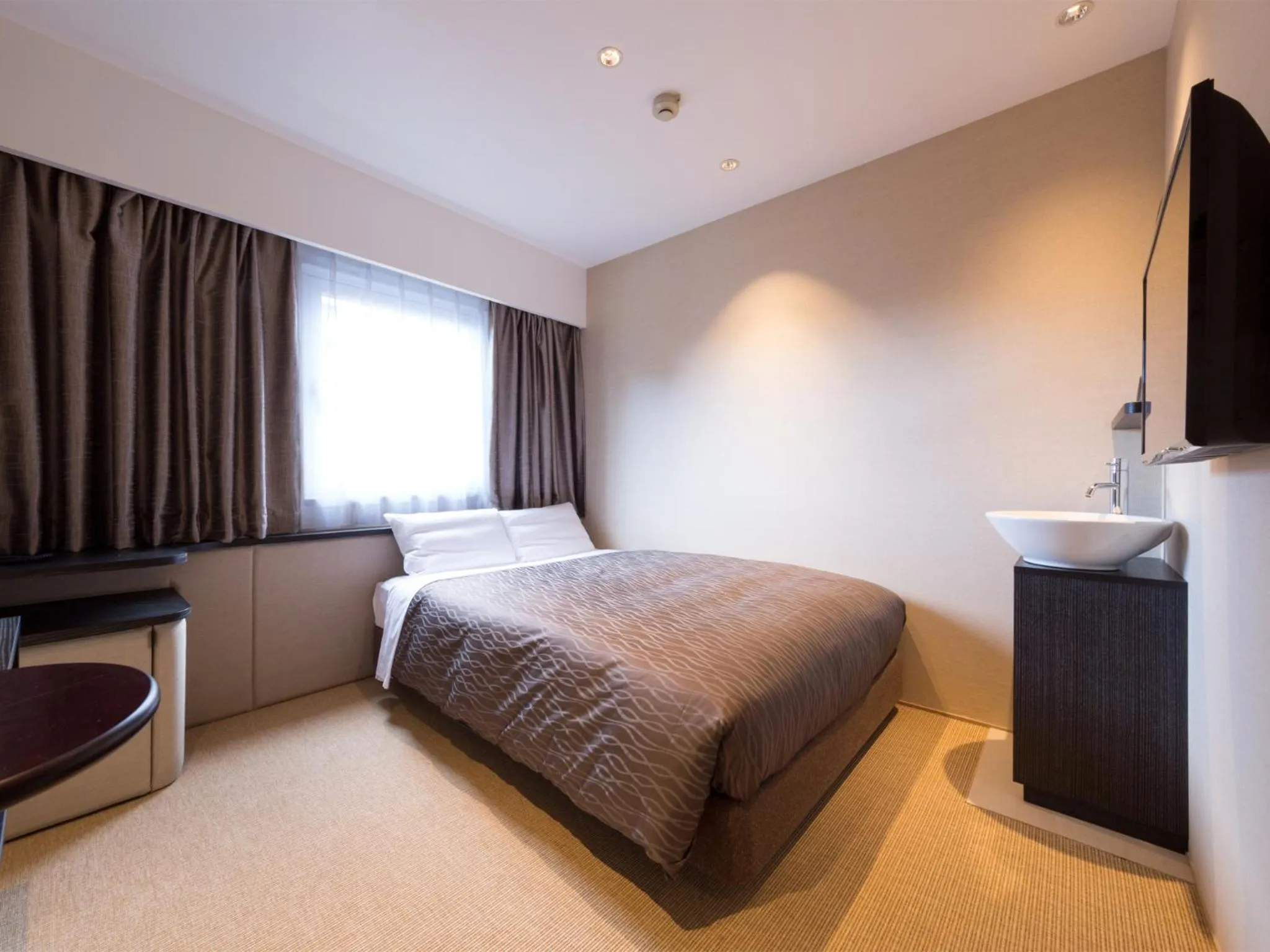 Photo of the whole room, Bed in THE HOTELS HAKATA KASANE Bayside