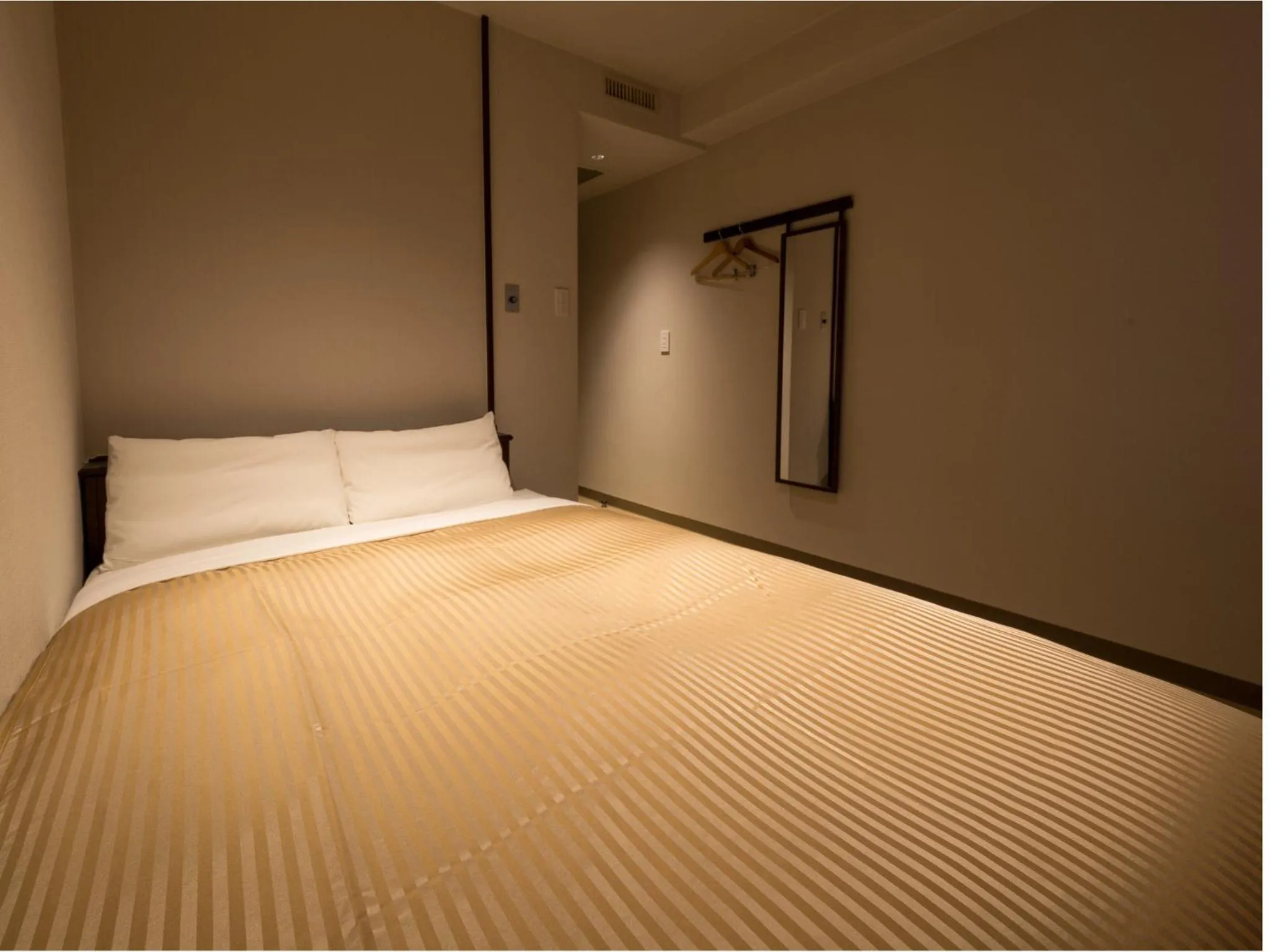 Photo of the whole room, Bed in THE HOTELS HAKATA KASANE Bayside