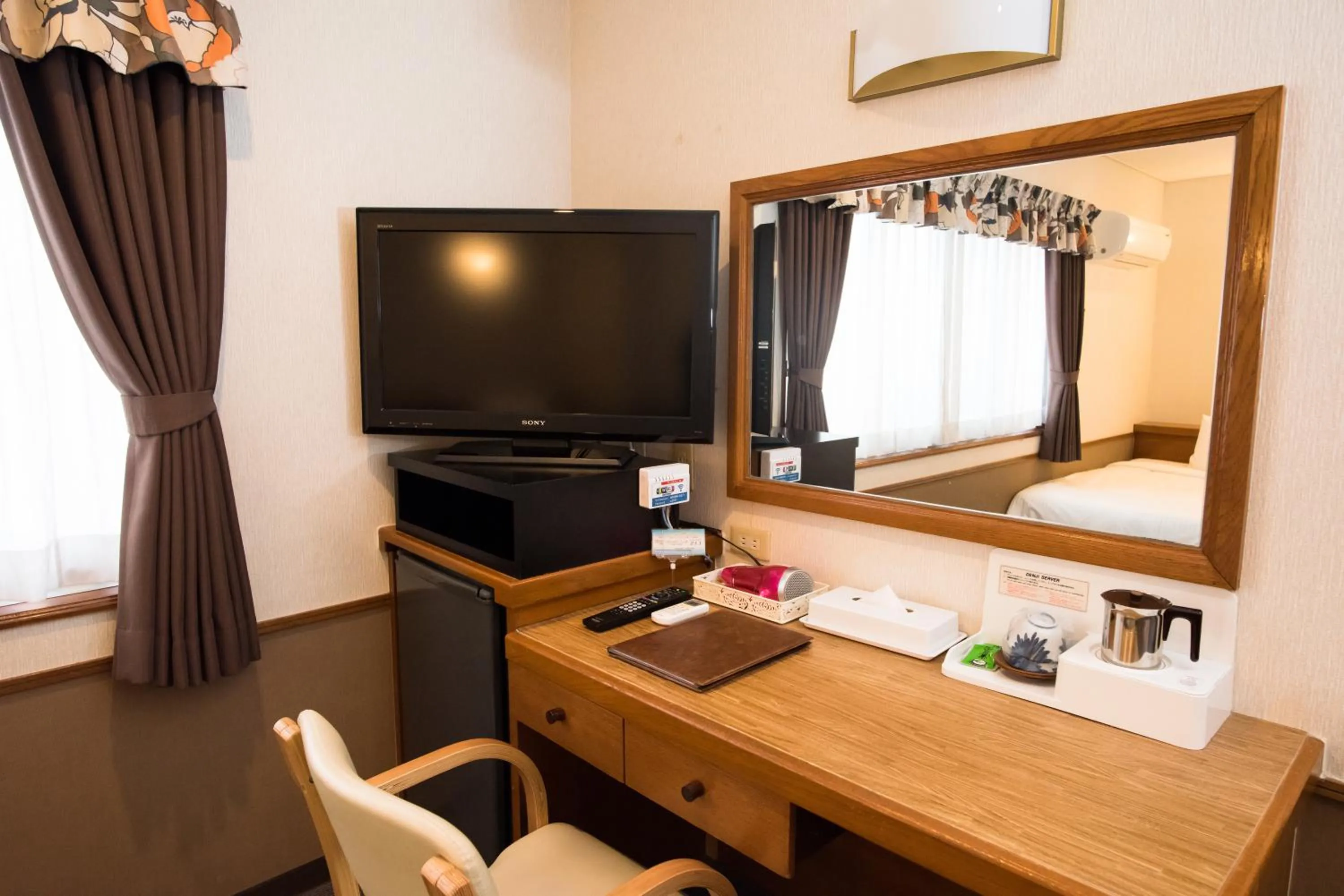 TV and multimedia in Crown Hotel Okinawa