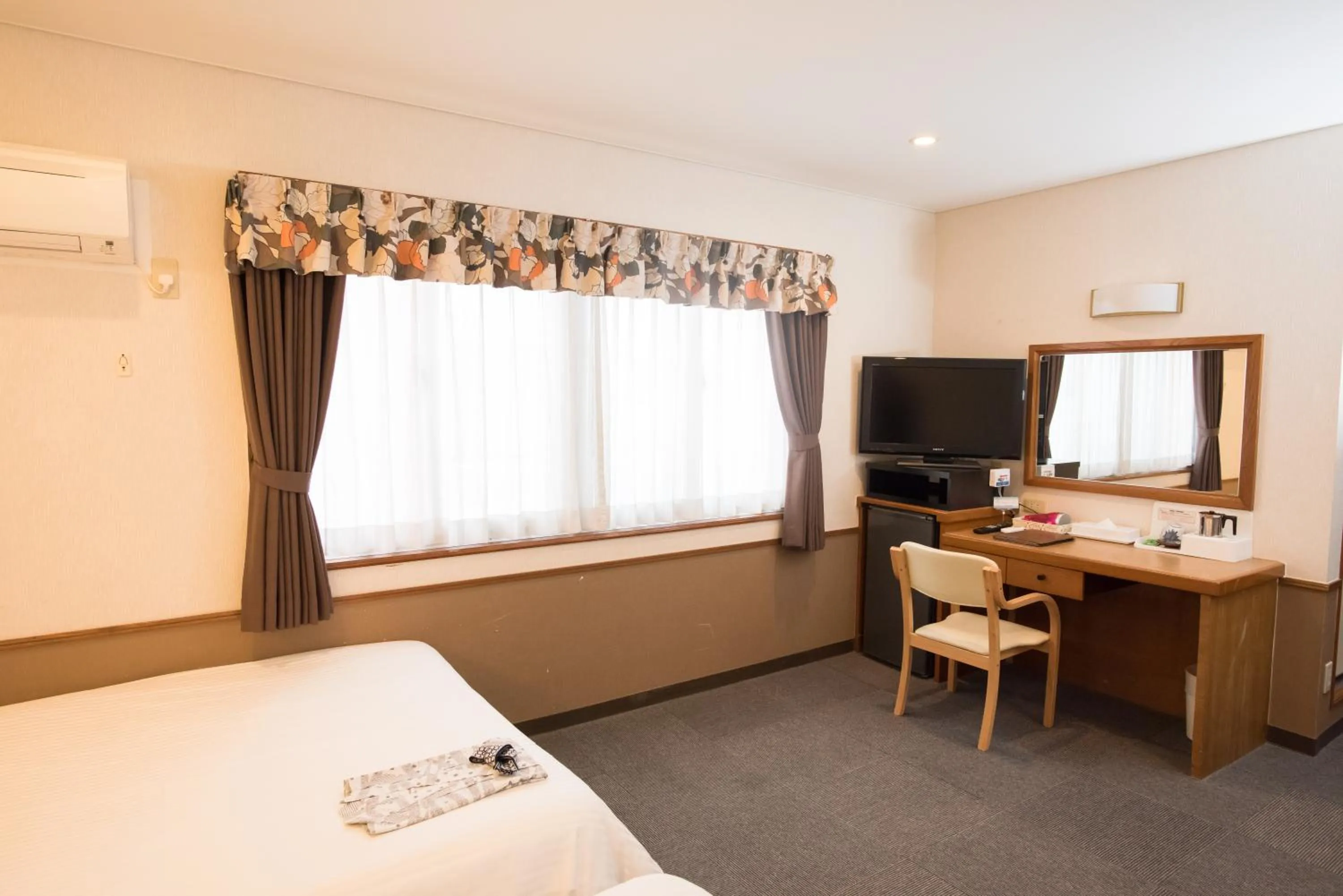 Bed in Crown Hotel Okinawa