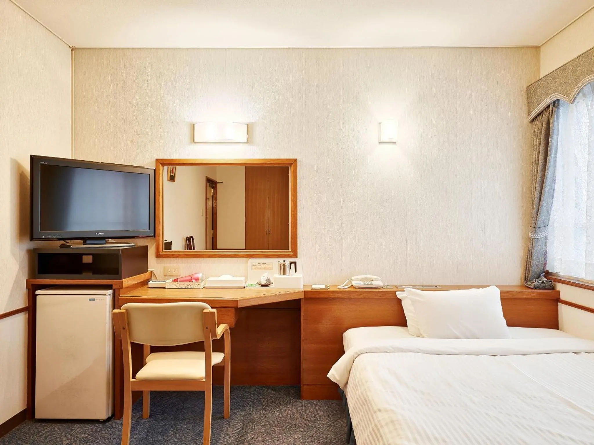 TV and multimedia, Bed in Crown Hotel Okinawa