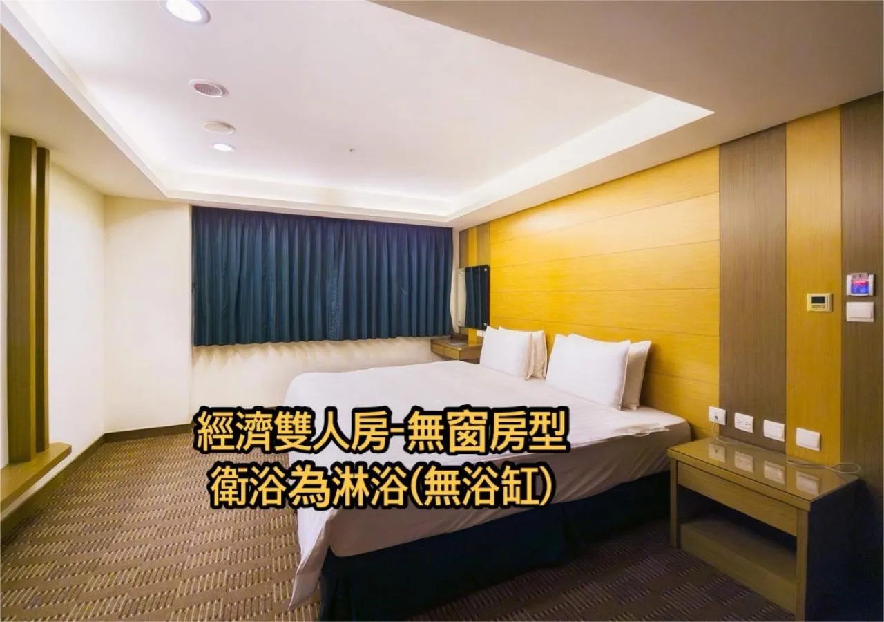 Bed in Cheng Wan Grand Hotel