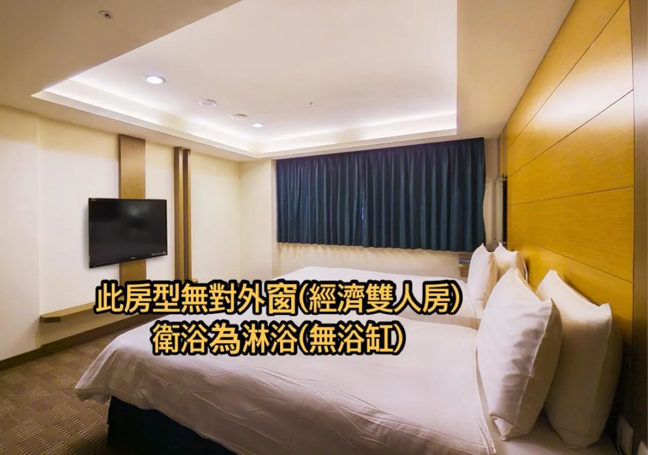 Bed in Cheng Wan Grand Hotel