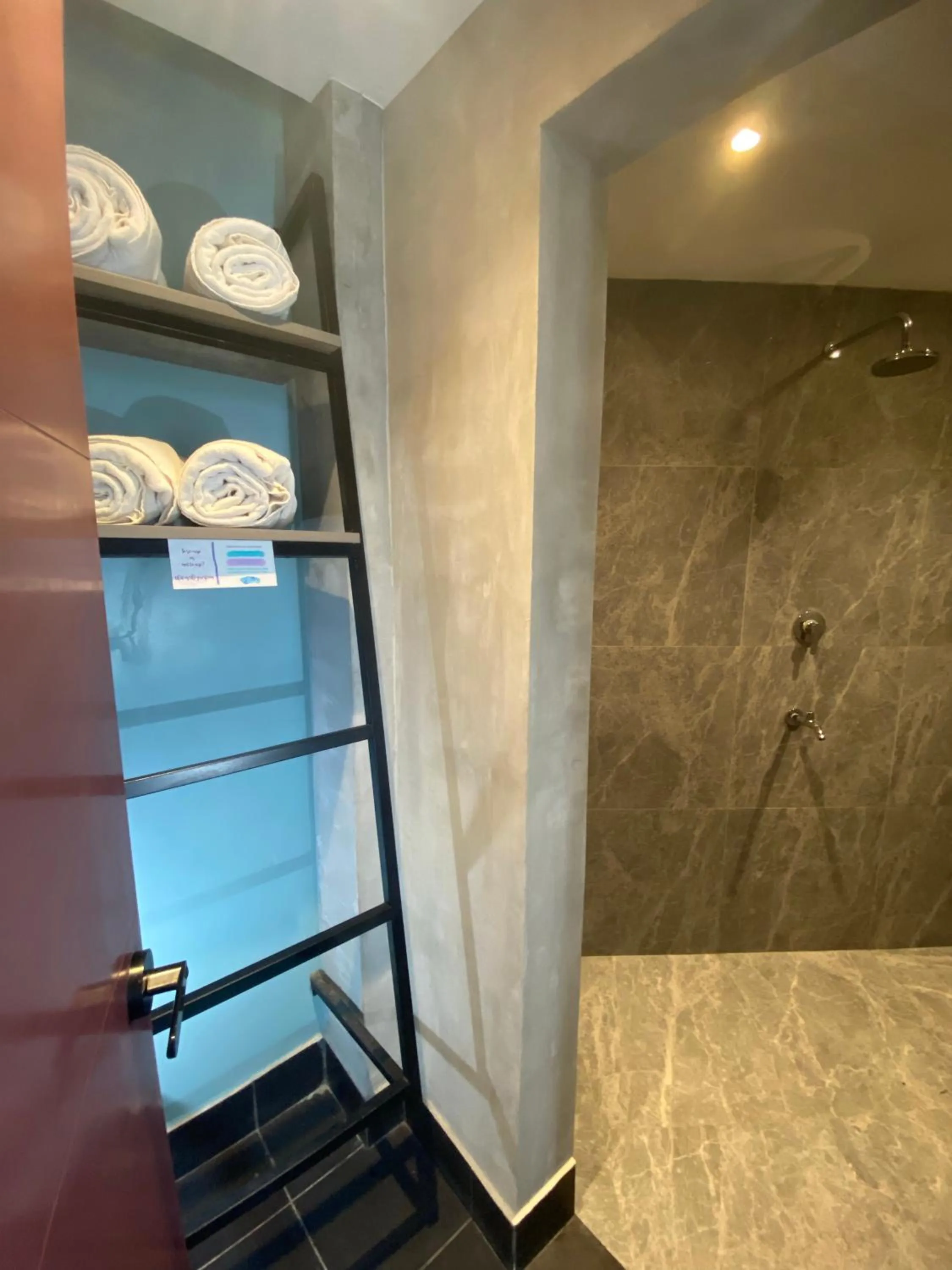 Shower in Zenvea Hotel