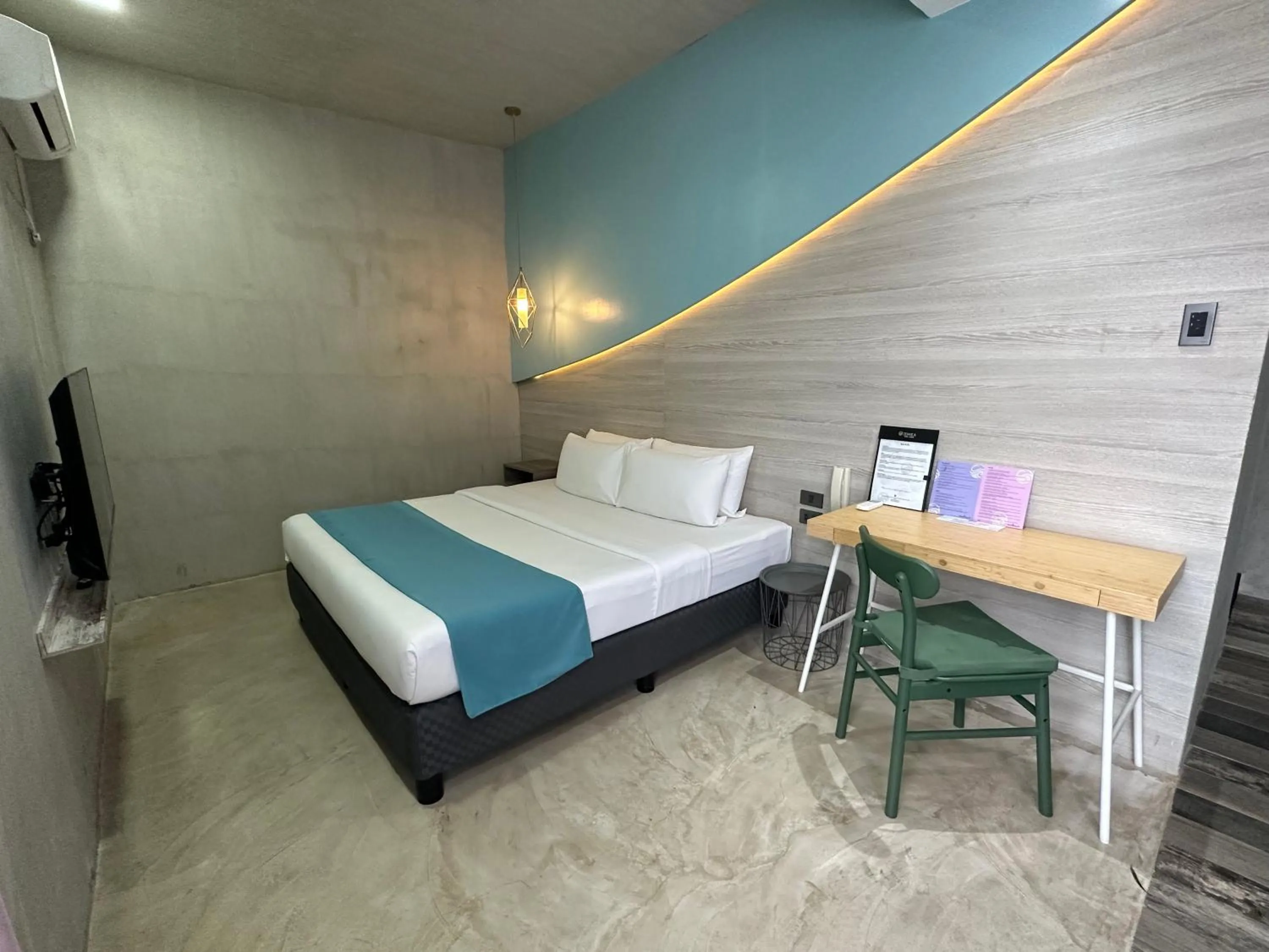 Bed in Zenvea Hotel