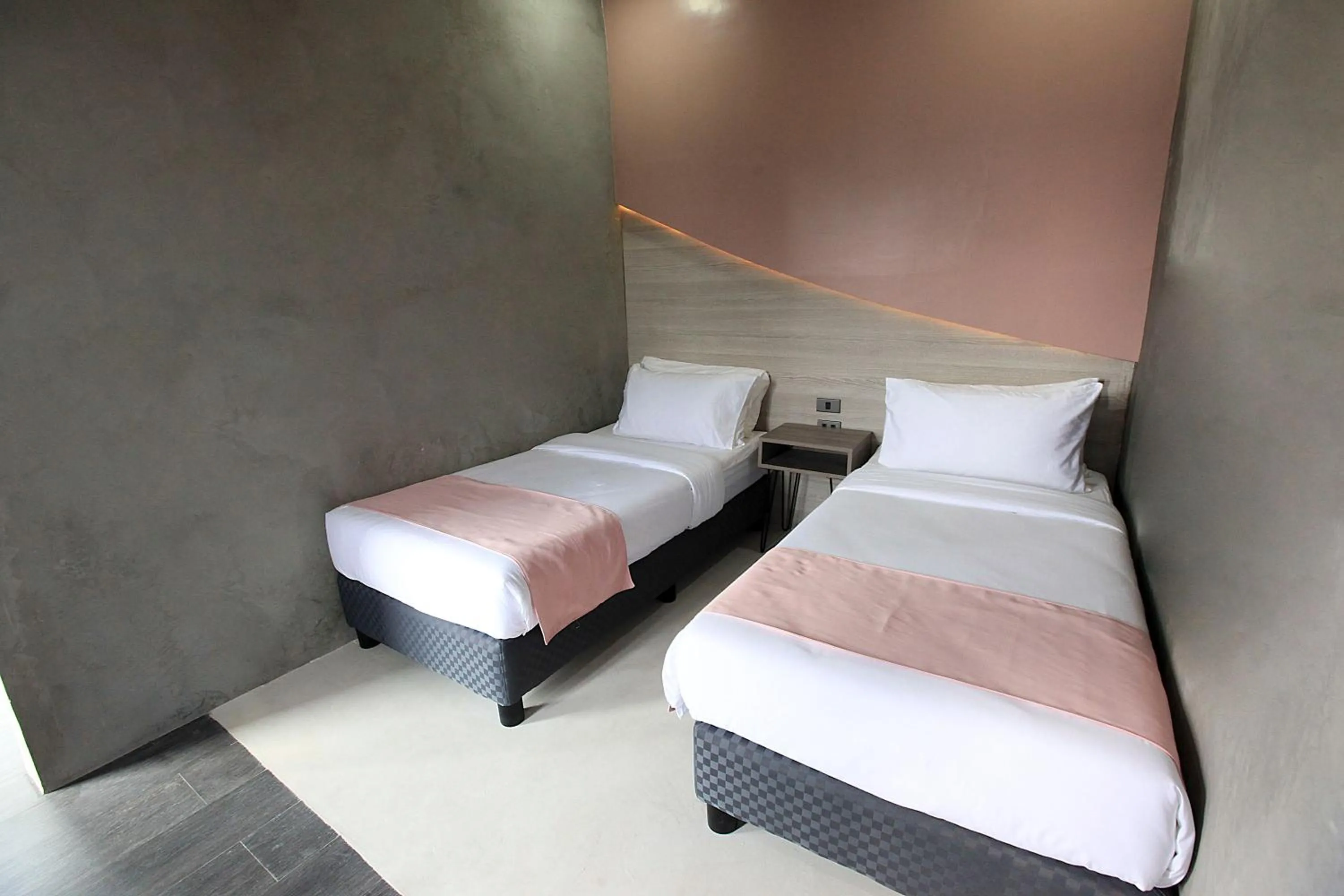 Bed in Zenvea Hotel