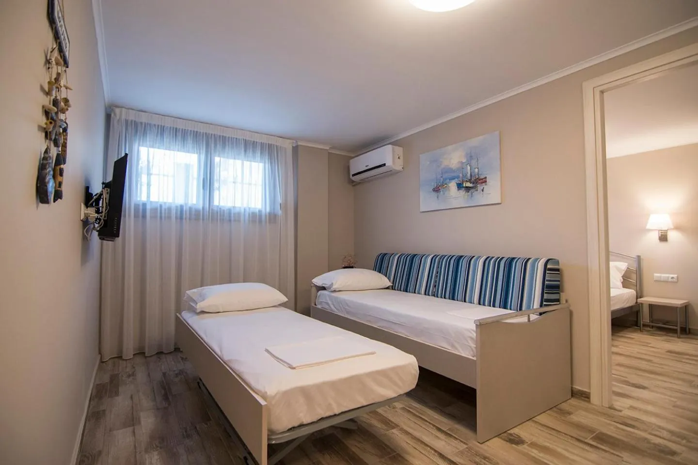 Bed in Amaranti Luxury Apartments