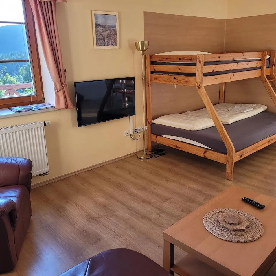 Bed in PENSION KUBU Apartment 3 samostatný byt s kuchyní