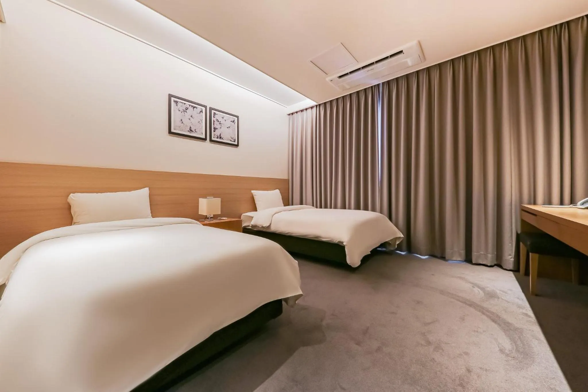 Property building, Bed in Sejong City Osong Hotel